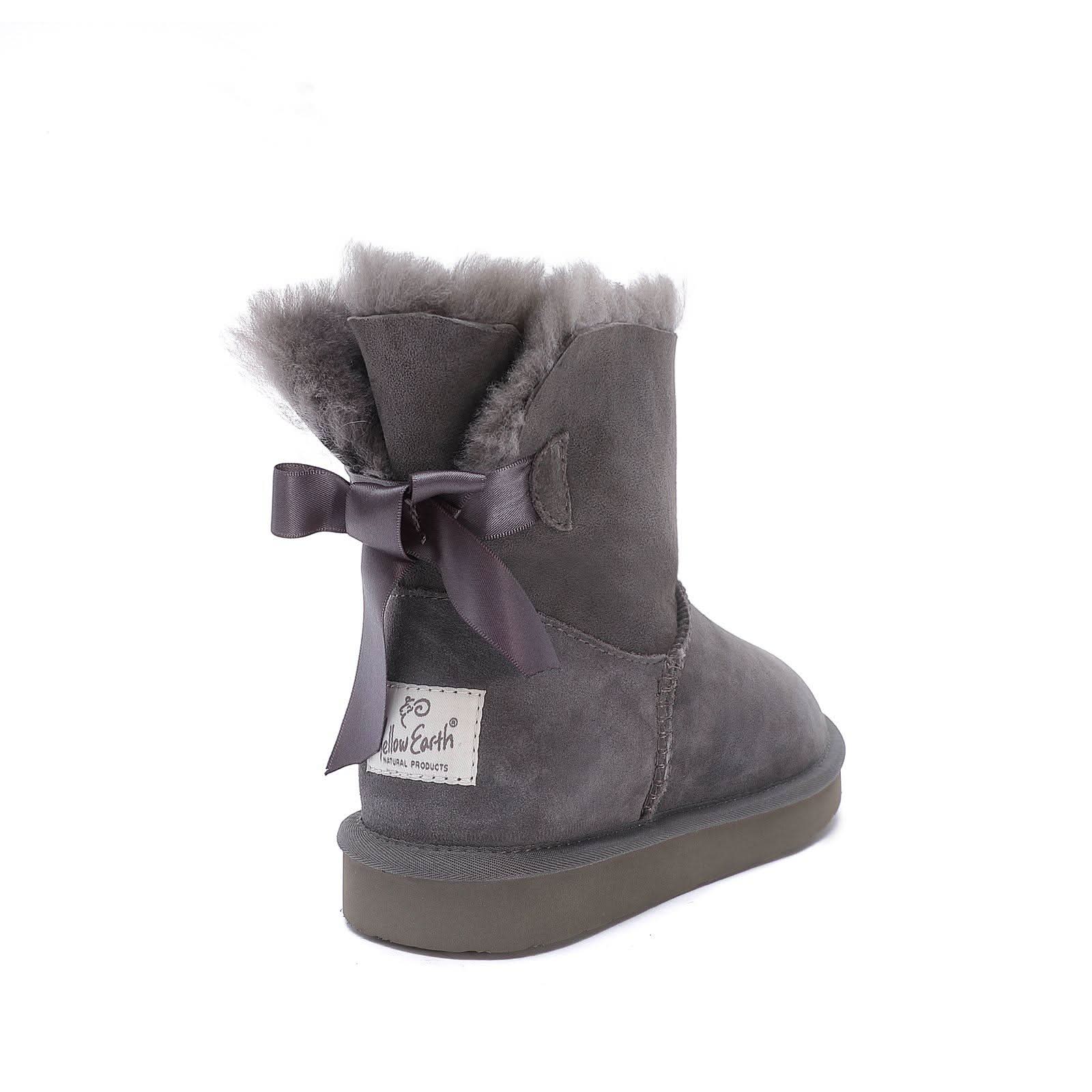 Grey sheepskin boot with fluffy wool collar and ribbon bow, rear view. - Yellow Earth Australia