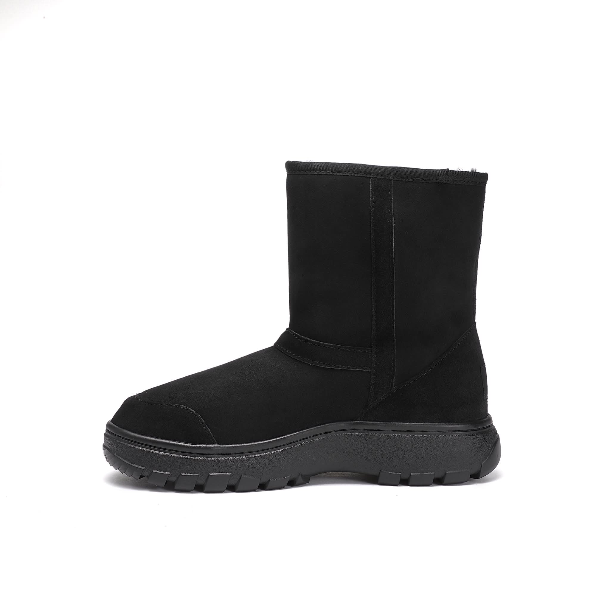 Black sheepskin mid-calf boot with chunky lug sole, side view. - Yellow Earth Australia