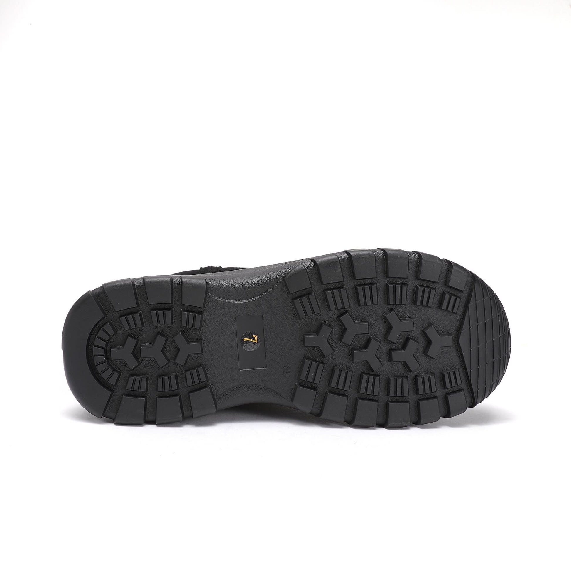 Black sheepskin winter boot sole view showing deep tread pattern and texture. - Yellow Earth Australia