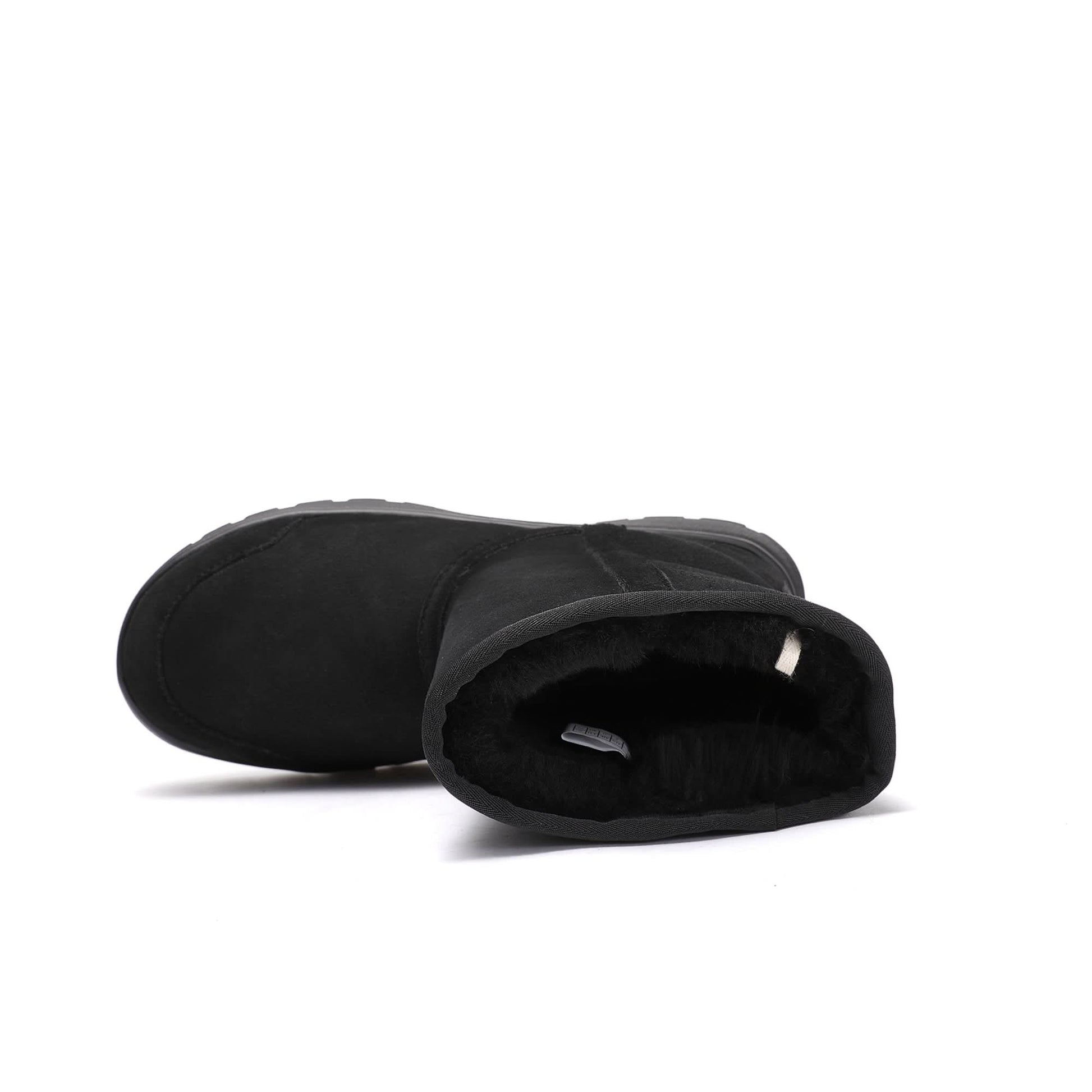Black suede sheepskin boots with fluffy wool interior, side view. - Yellow Earth Australia