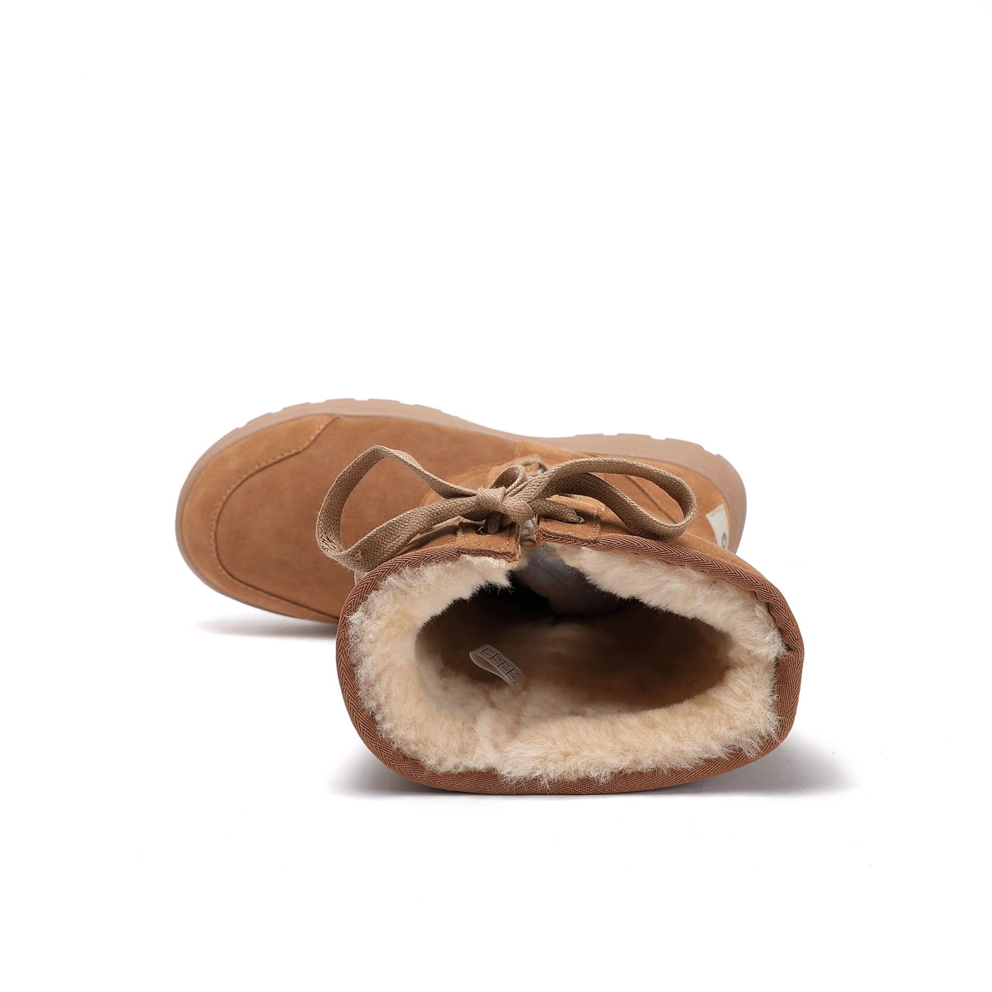Tan sheepskin boot with wool lining, top-down view showing interior. - Yellow Earth Australia
