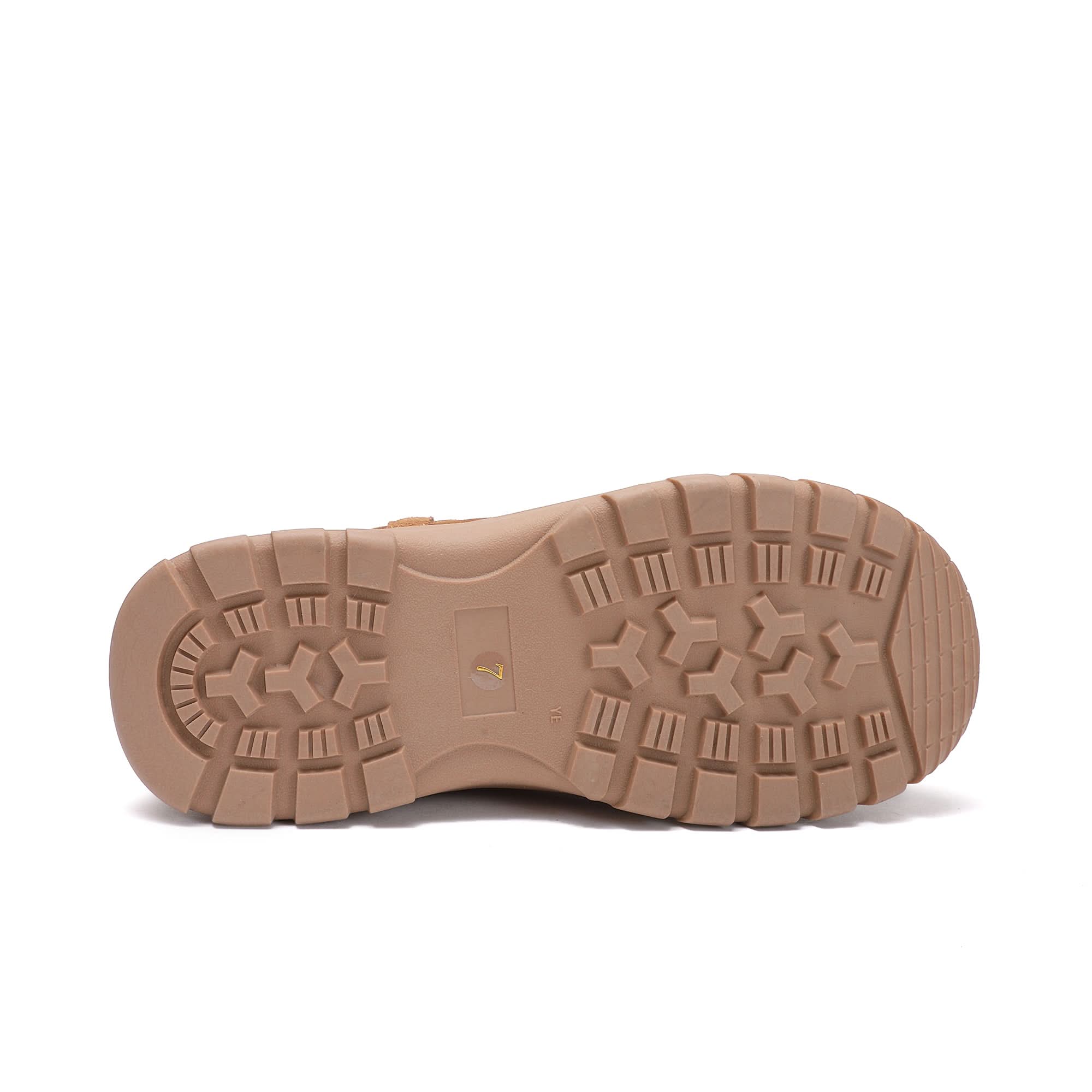 Beige sheepskin boot sole showing textured tread pattern from underneath. - Yellow Earth Australia