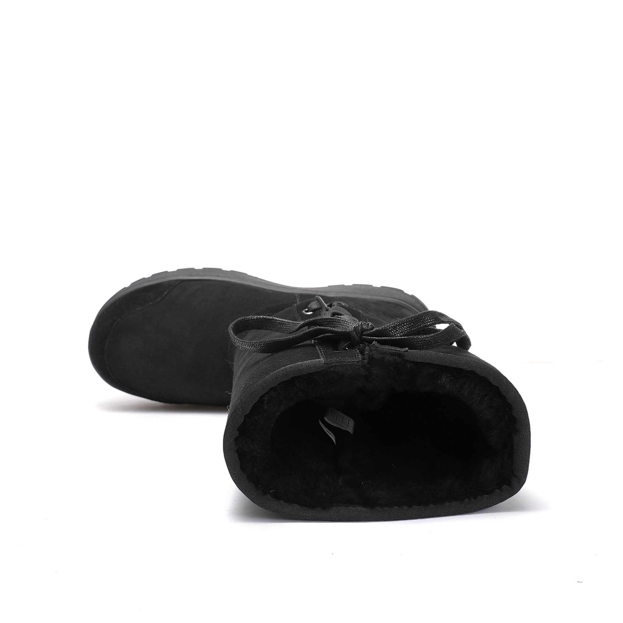 Black sheepskin and suede ankle boot with wool lining, top-down view. - Yellow Earth Australia