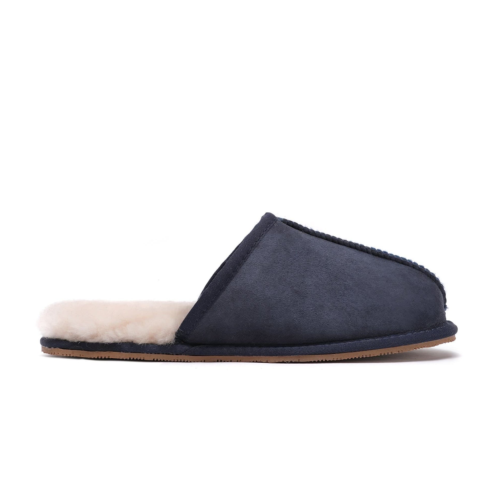 Navy blue sheepskin slipper with cream wool lining, side view. - Yellow Earth Australia