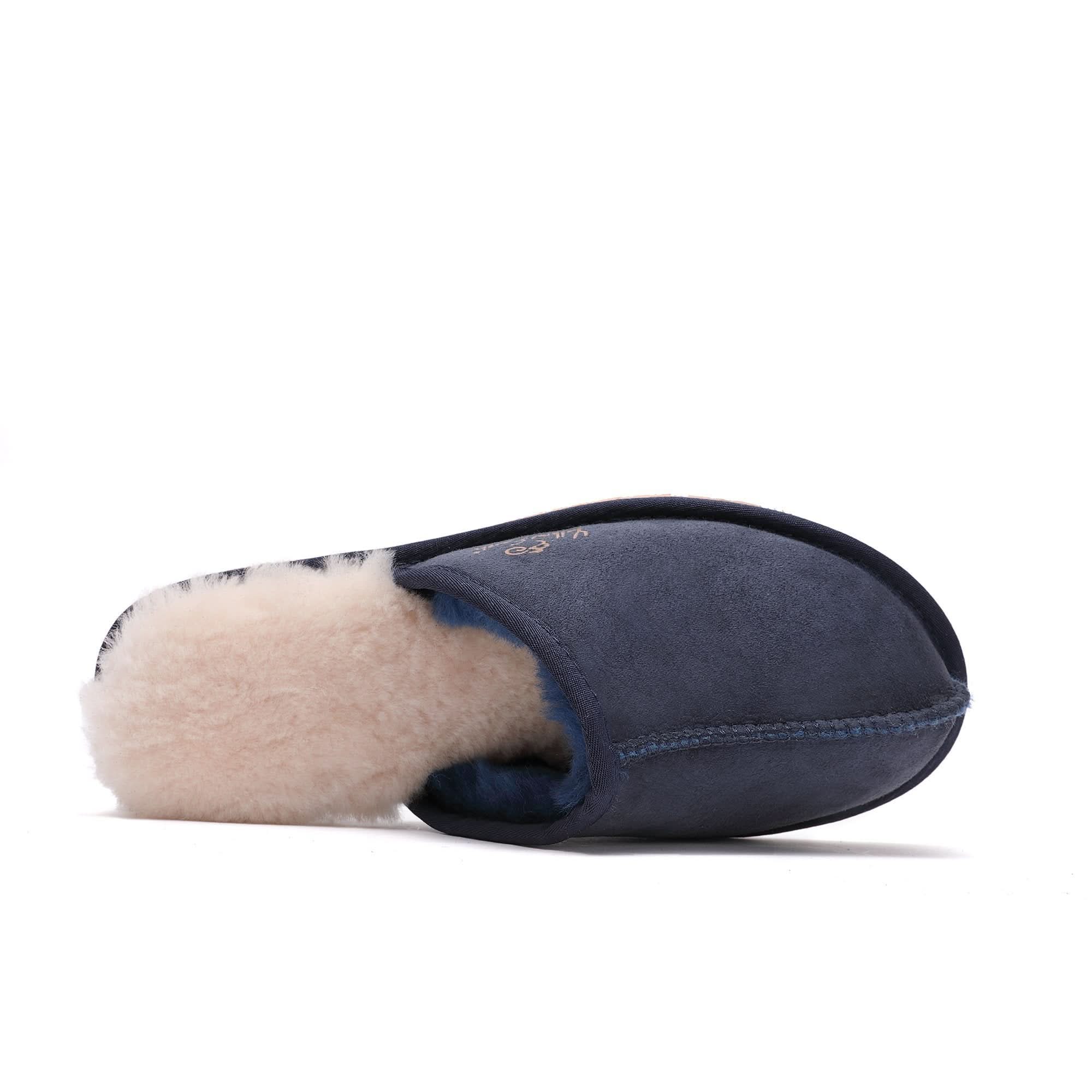 Navy blue sheepskin moccasin slipper with cream wool lining, side view. - Yellow Earth Australia