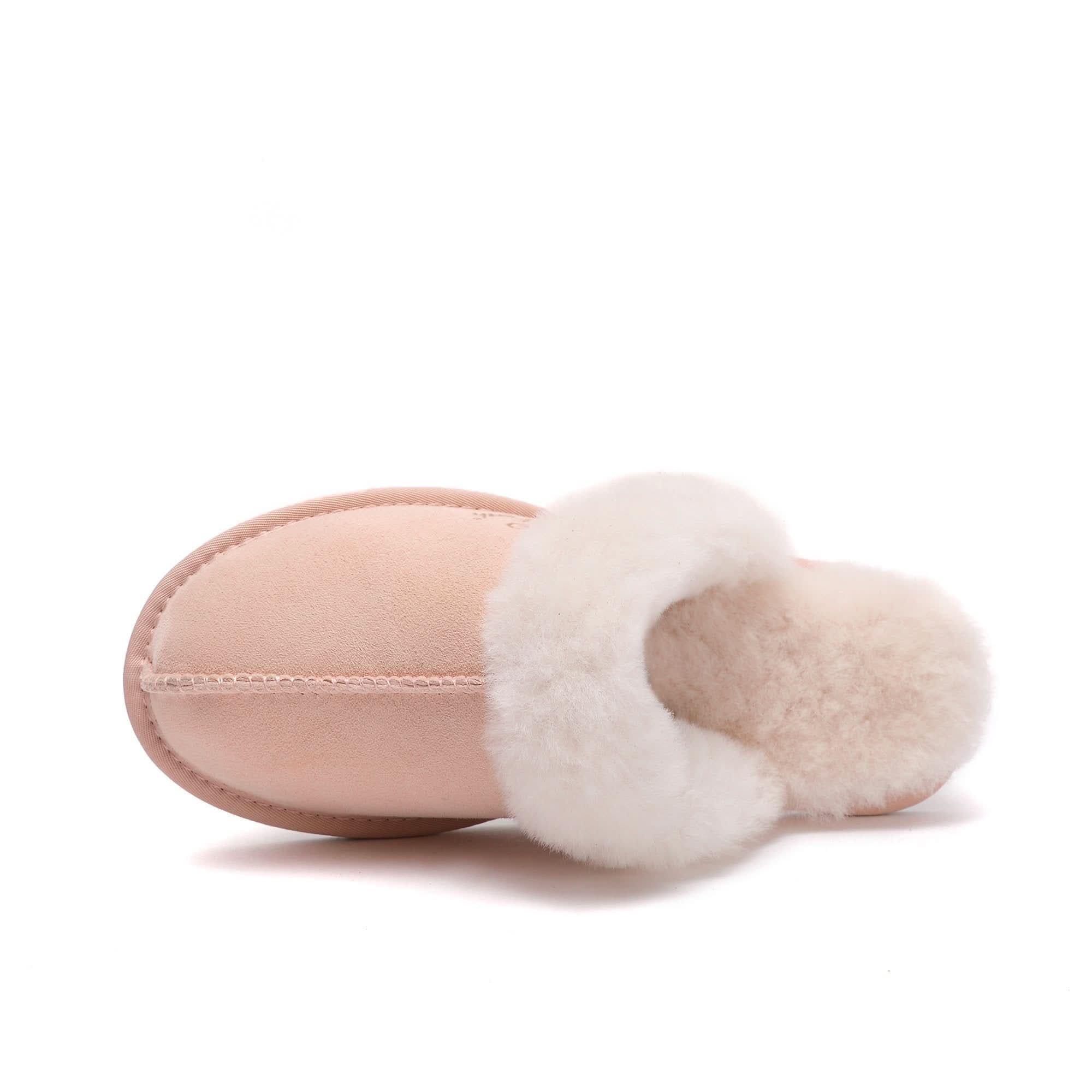 Pink sheepskin slipper with fluffy wool lining, top view on white background. - Yellow Earth Australia