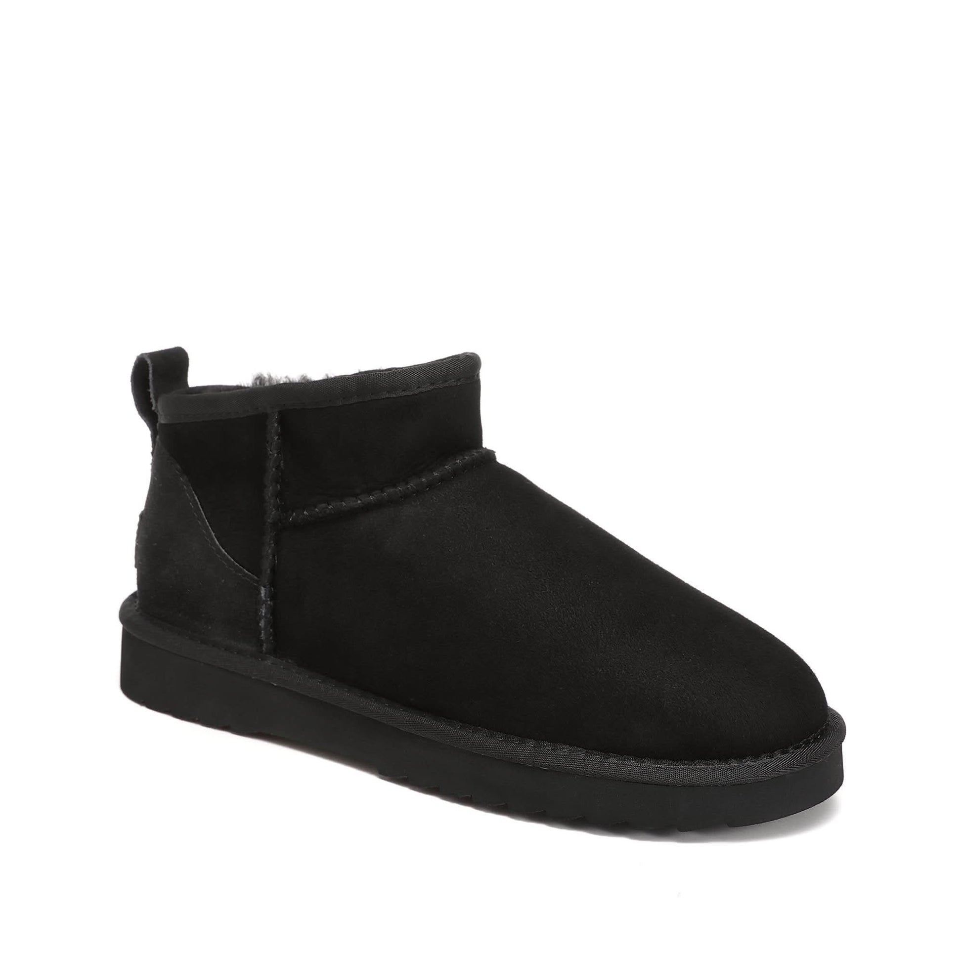 Black suede sheepskin ankle boot with fluffy wool lining, side view. - Yellow Earth Australia