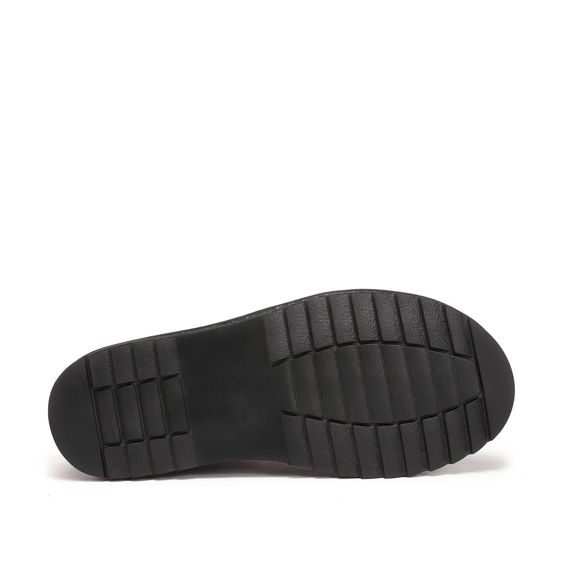 Black sheepskin slip-on shoe sole view showing textured rubber outsole. - Yellow Earth Australia