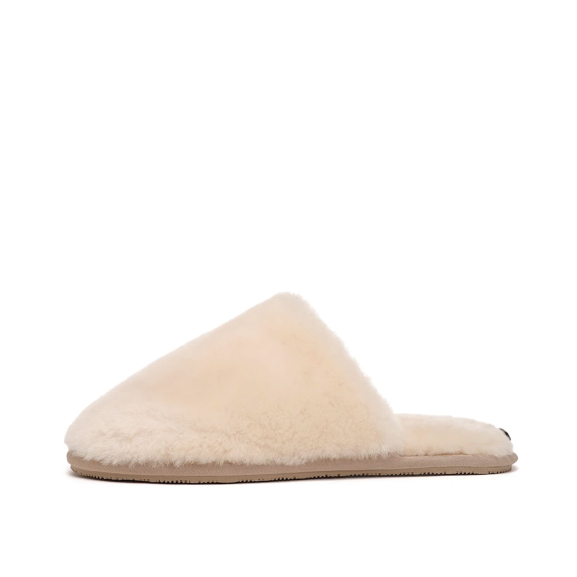 Cream sheepskin slipper with fluffy wool lining, side view on white background. - Yellow Earth Australia