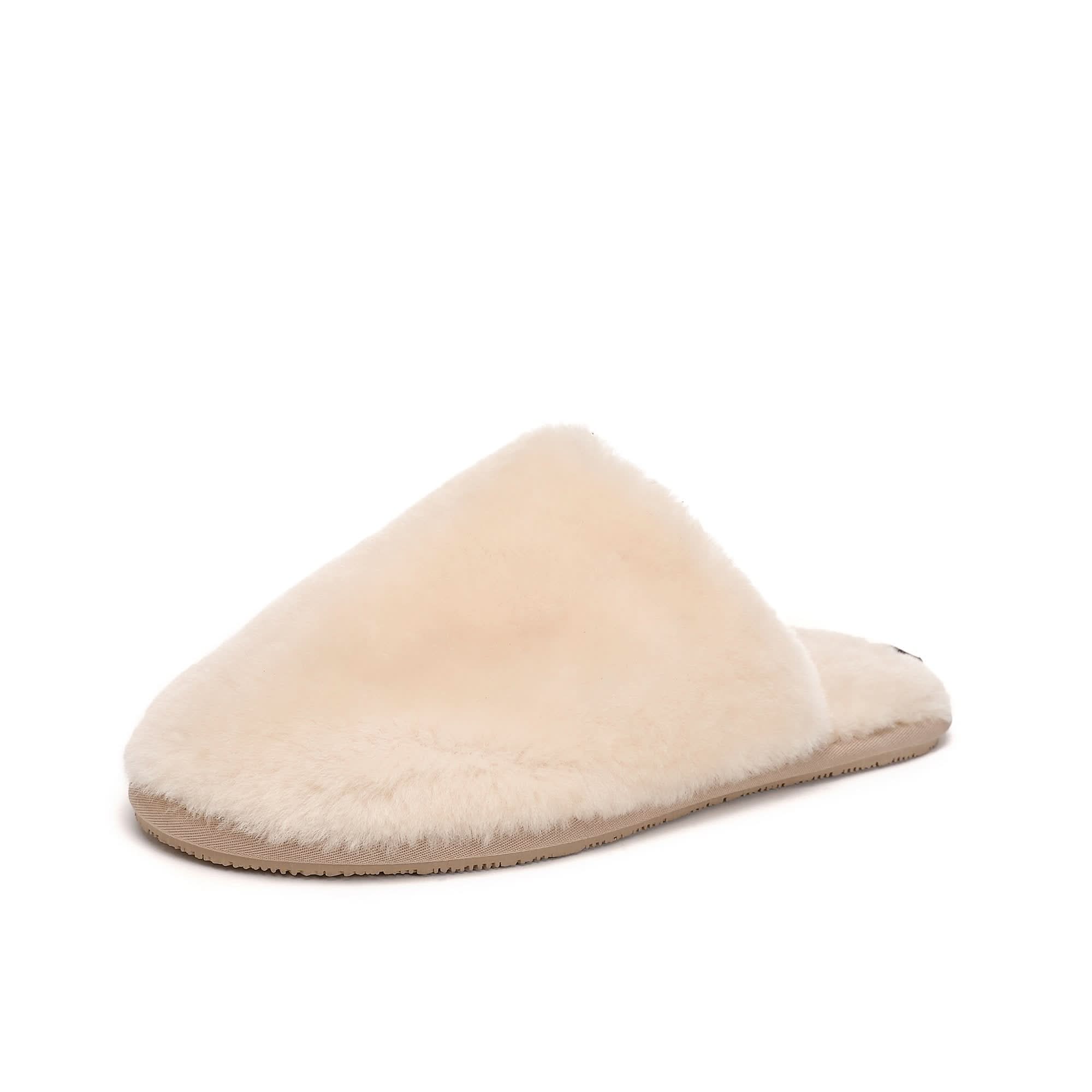 Cream sheepskin slipper with soft wool upper, viewed from the side angle. - Yellow Earth Australia