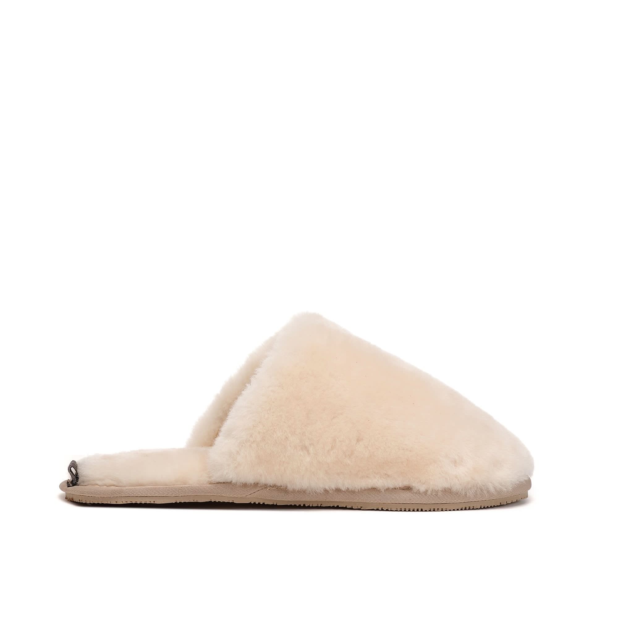 Cream sheepskin slipper with fluffy wool upper, side view on white background. - Yellow Earth Australia
