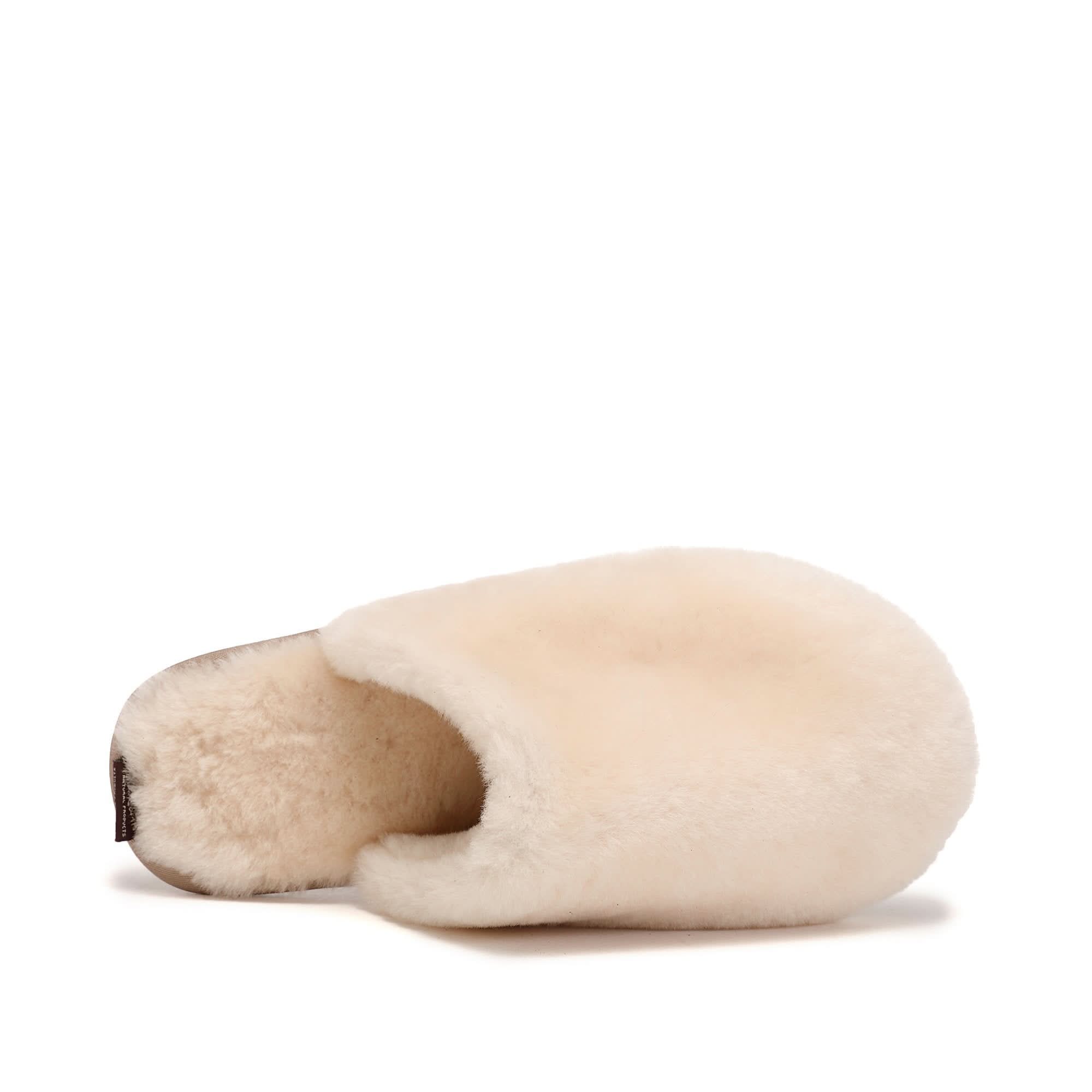 Cream sheepskin slipper with soft wool lining, side view. - Yellow Earth Australia