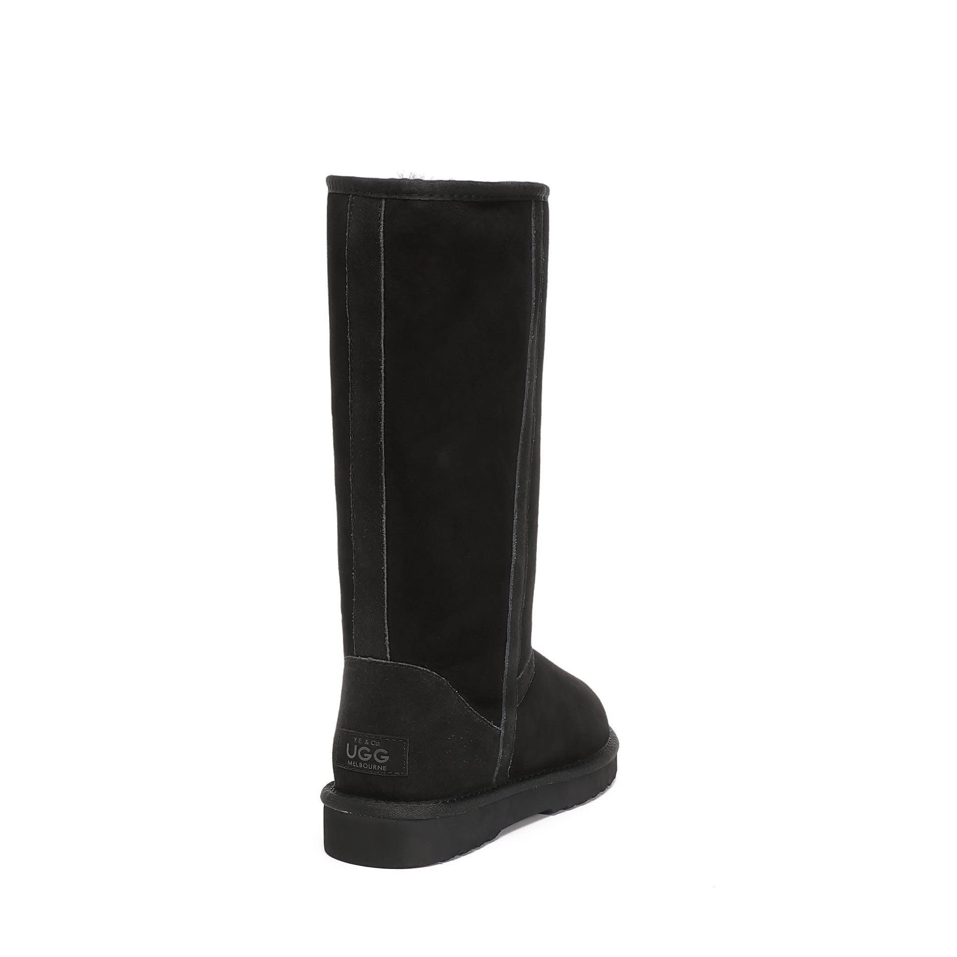 Black tall sheepskin boot shown from the back angle, featuring suede exterior and wool lining. - Yellow Earth Australia
