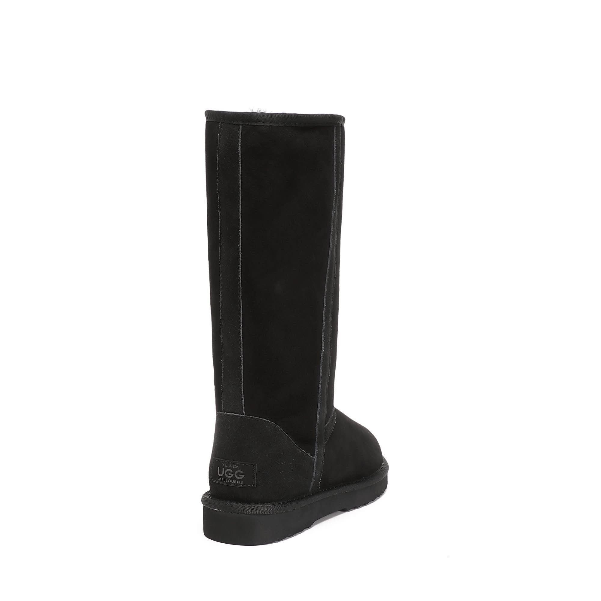 Black tall sheepskin boot shown from the back angle, featuring suede exterior and wool lining. - Yellow Earth Australia