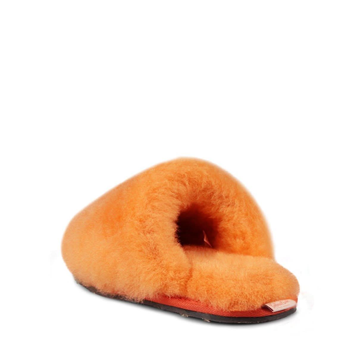 Orange sheepskin slippers with fluffy wool lining, side view. - Yellow Earth Australia