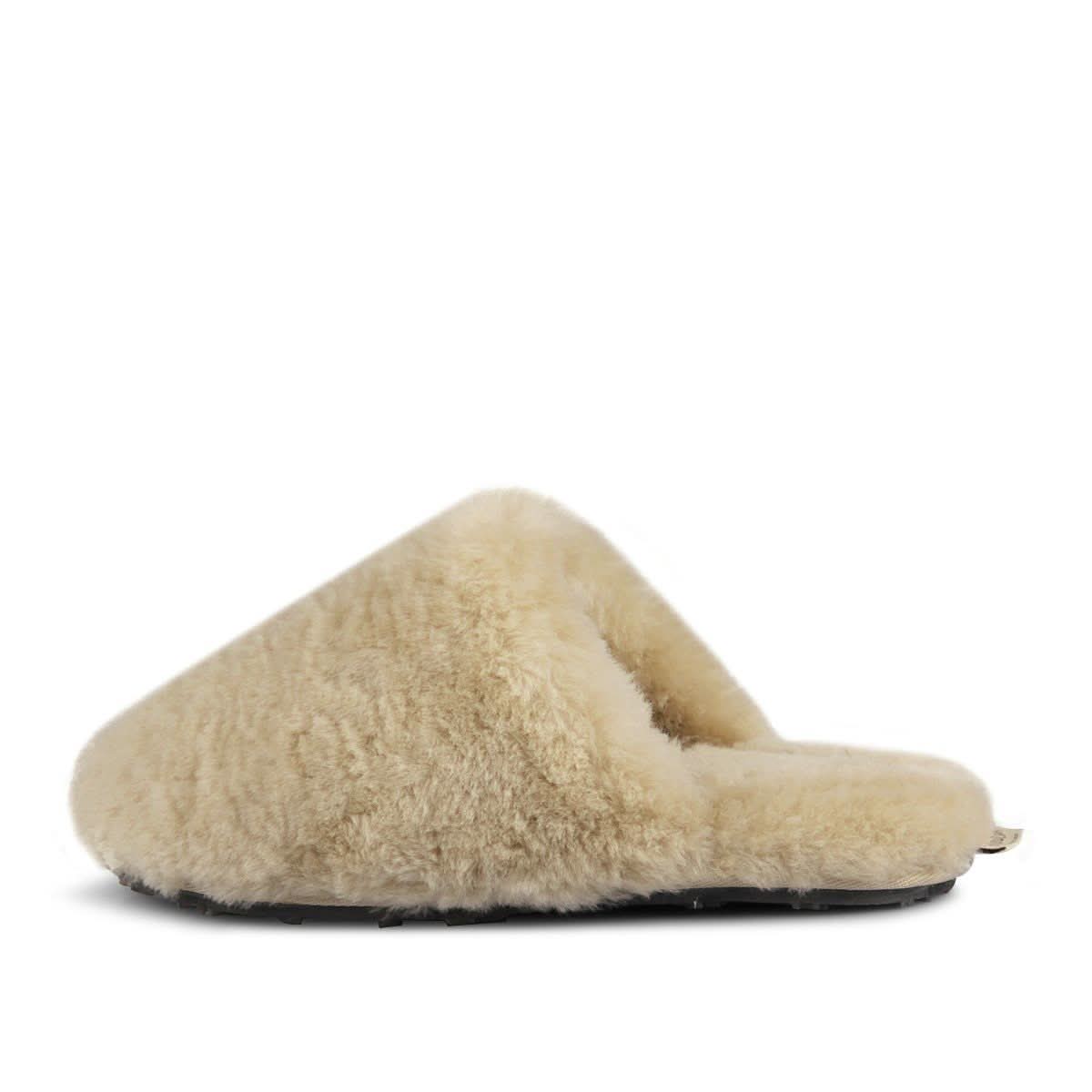 Cream sheepskin slipper with soft wool lining, side view on white background. - Yellow Earth Australia