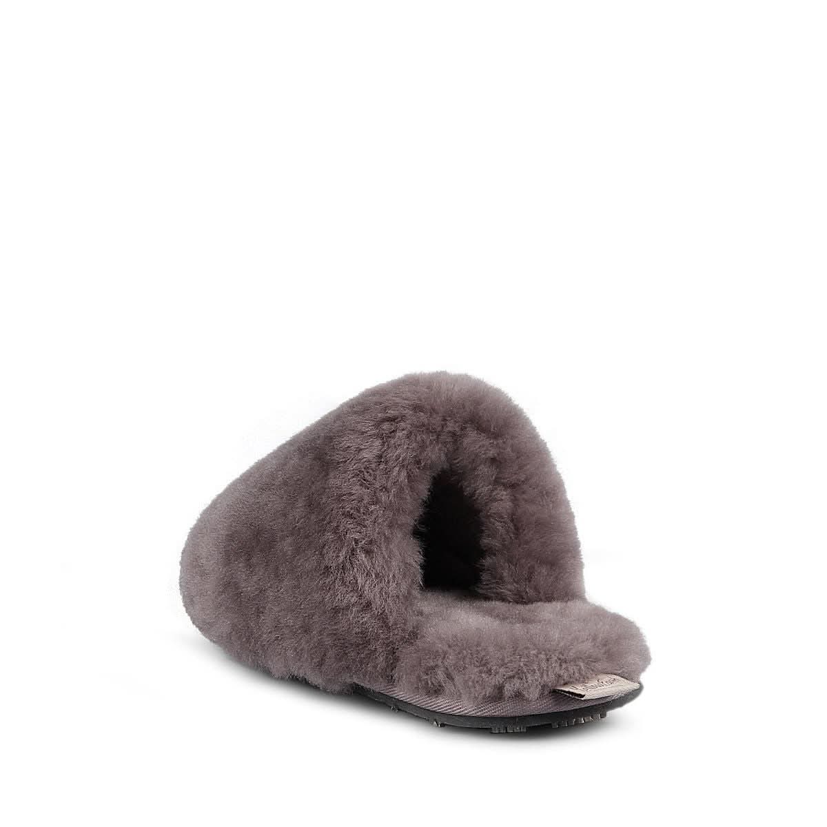 Grey sheepskin slipper with fluffy wool upper and dark sole, side view. - Yellow Earth Australia