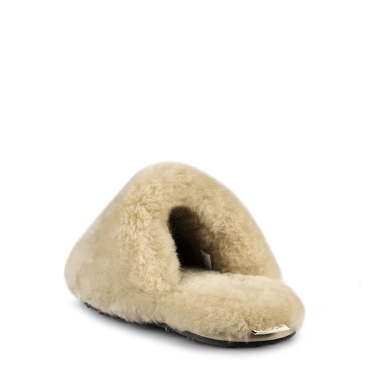 Cream sheepskin bootie slipper with fuzzy wool lining, side view. - Yellow Earth Australia