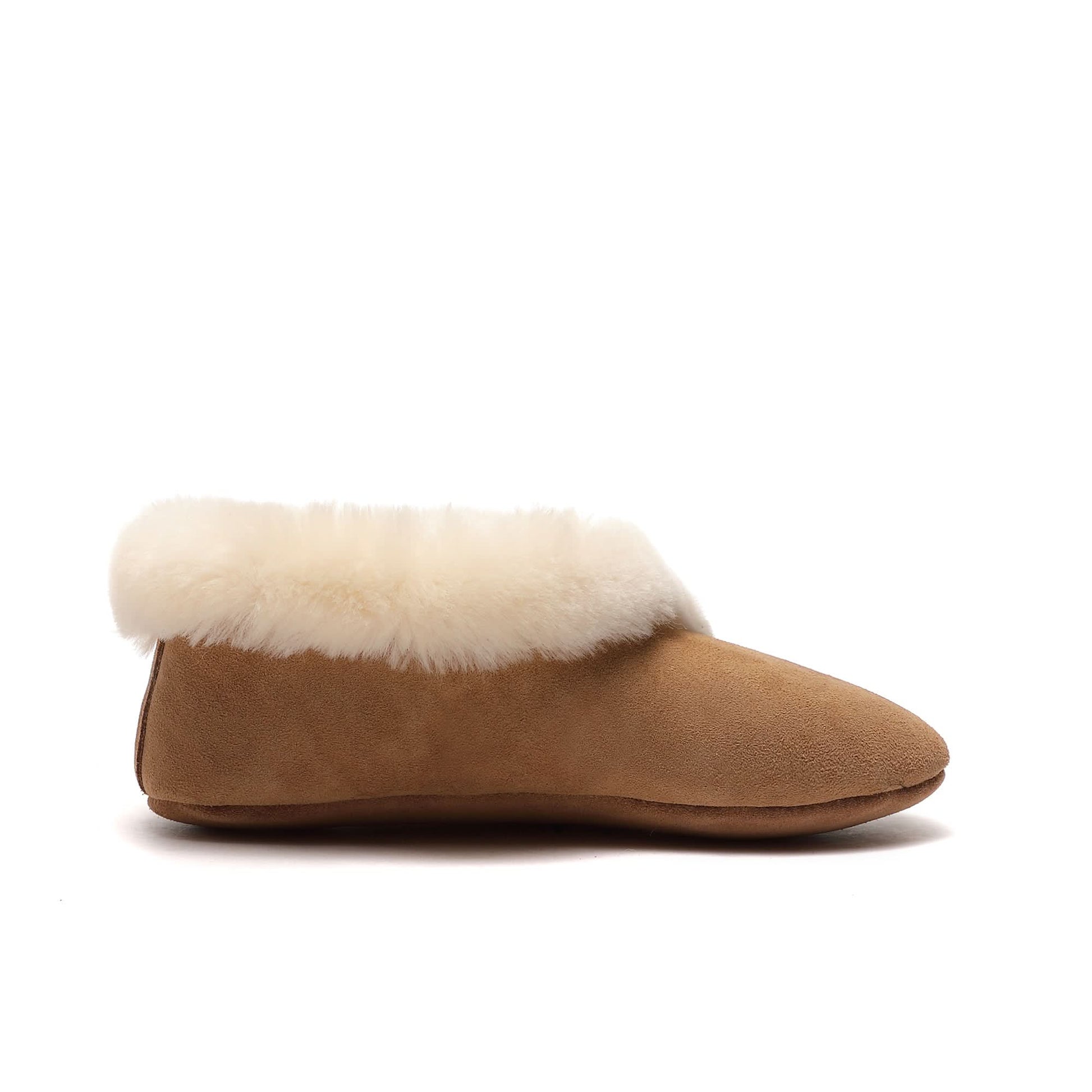 Tan suede bootie slipper with cream sheepskin fur collar, side view. - Yellow Earth Australia
