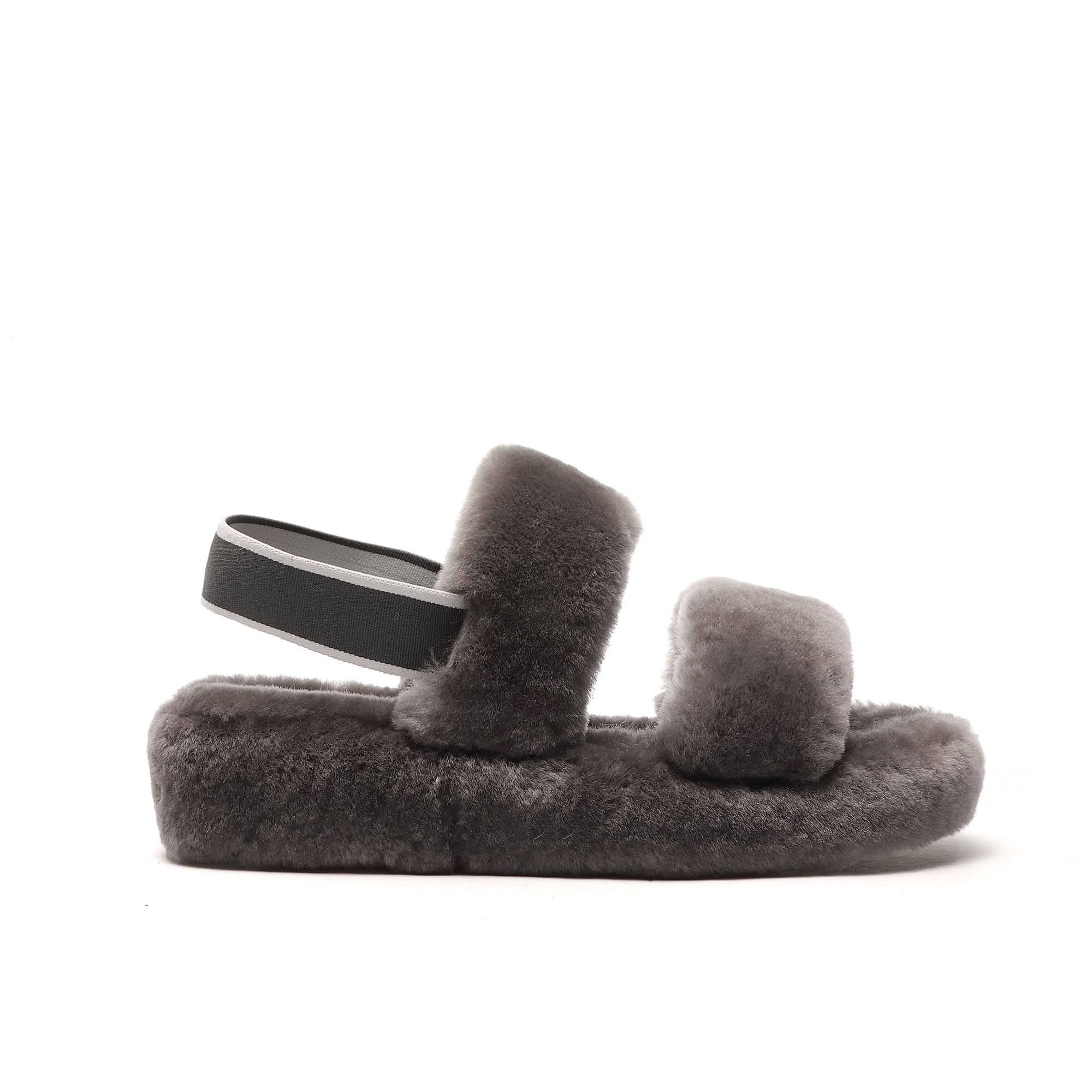 Grey fluffy sheepskin slider sandal with adjustable strap, side view. - Yellow Earth Australia