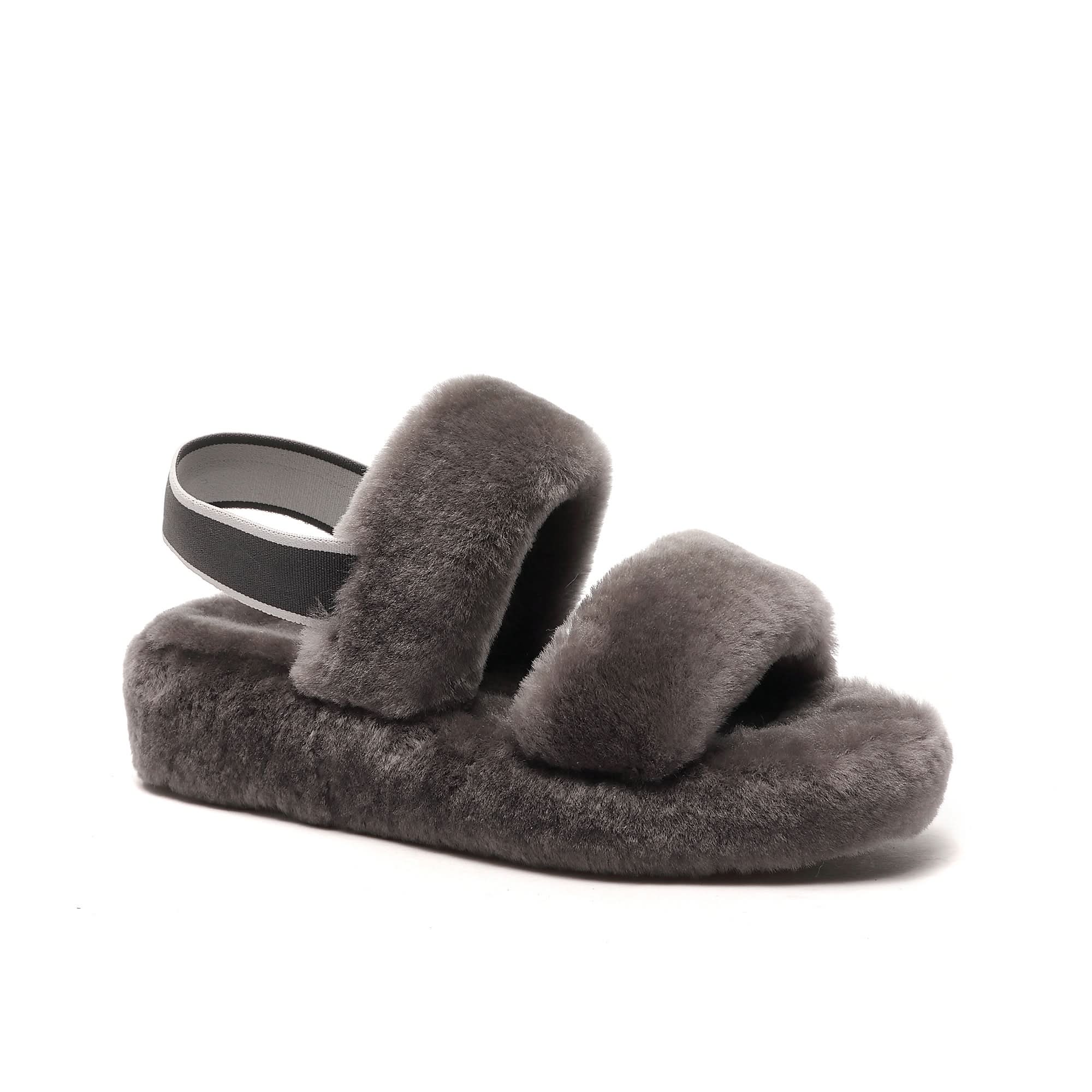Grey sheepskin slipper sandal with fluffy wool upper and elastic back strap, side view. - Yellow Earth Australia