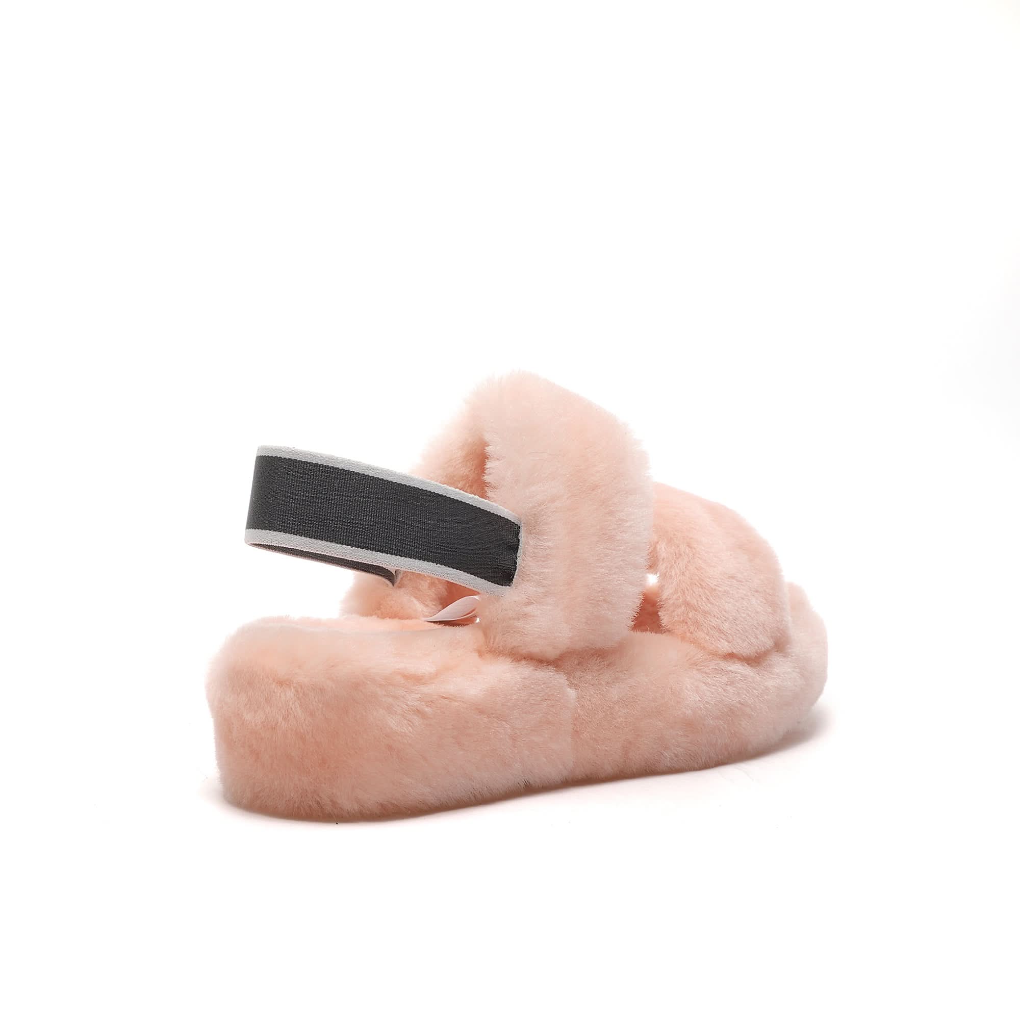 Pink sheepskin slipper with black headband, side view on white background. - Yellow Earth Australia