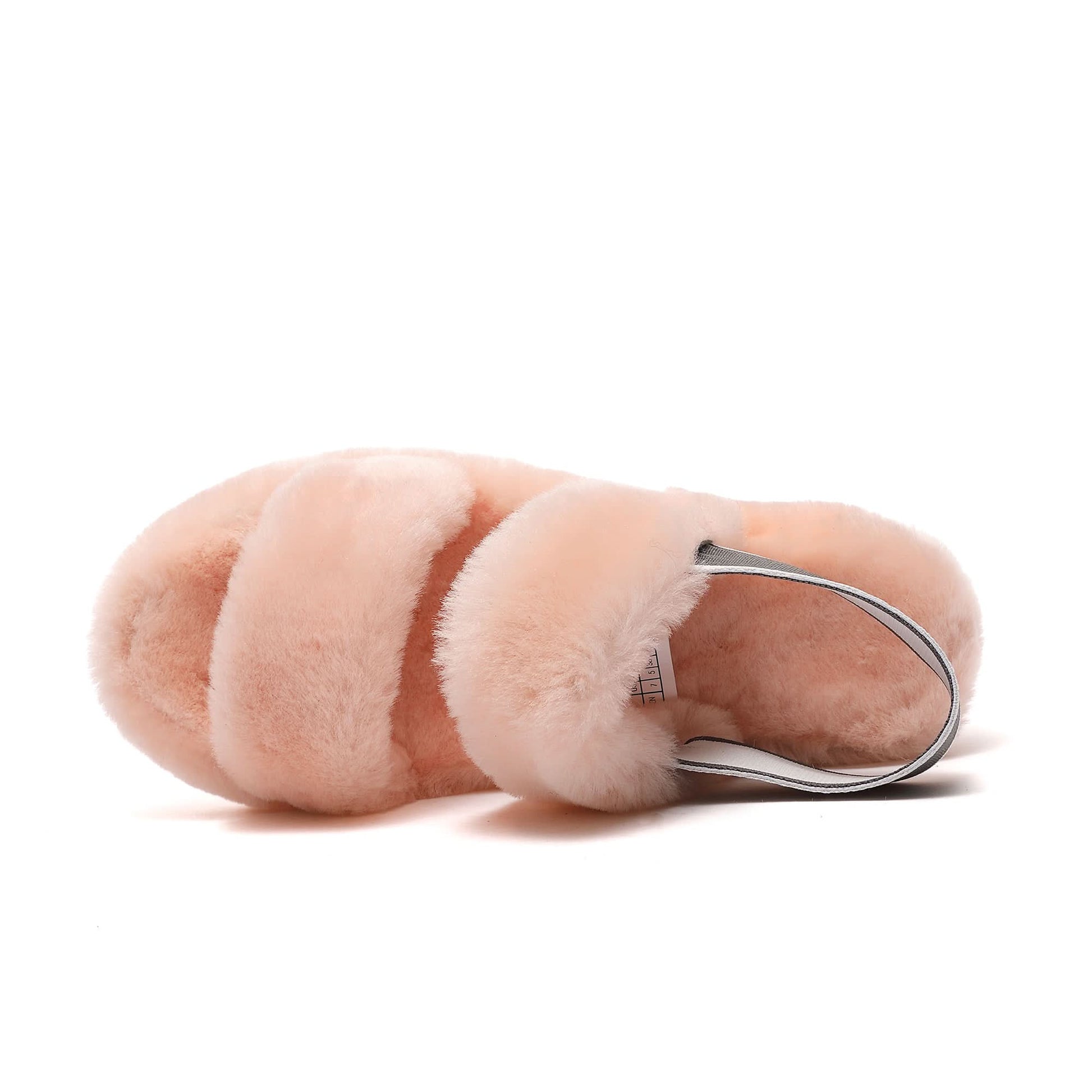 Pink sheepskin slipper with wool lining viewed from above on white background. - Yellow Earth Australia