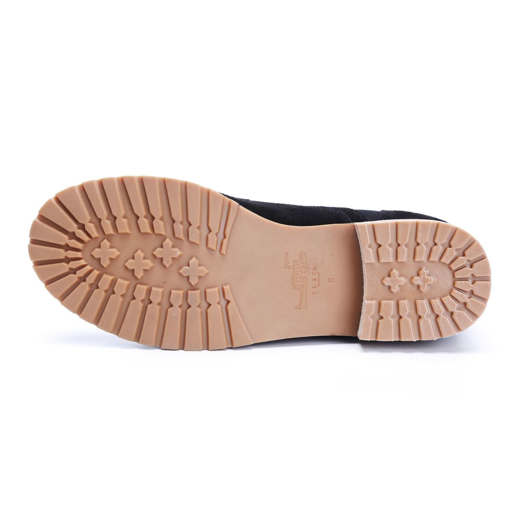 Black wool loafer sole view showing tan crepe rubber outsole with treaded pattern. - Yellow Earth Australia