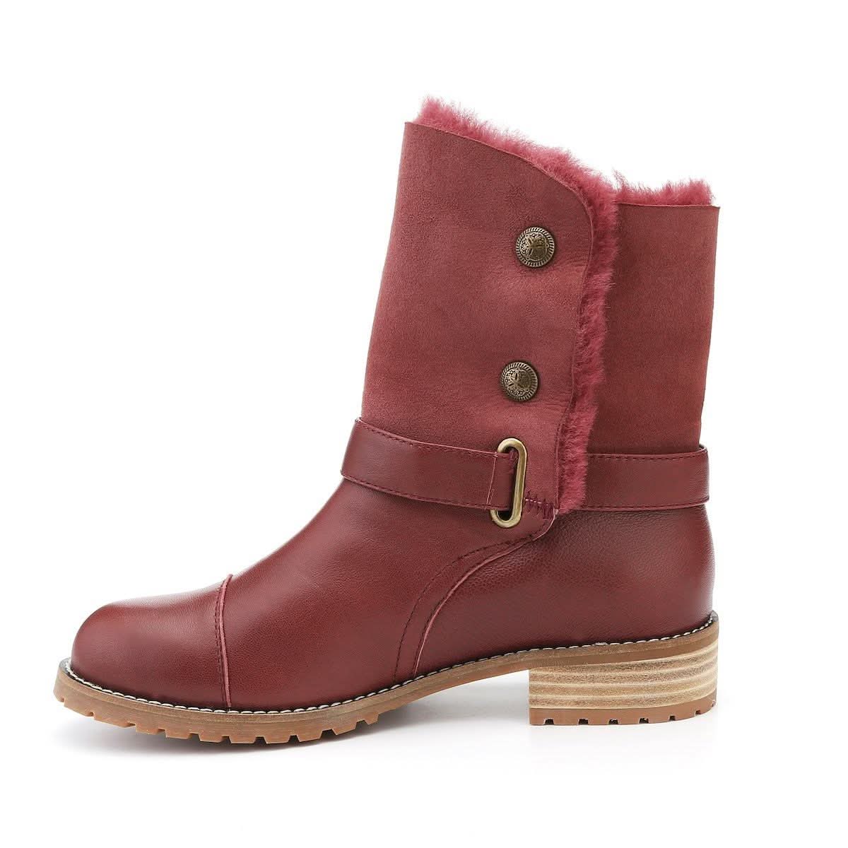 Burgundy sheepskin boot with fur lining, leather strap and lug sole, side view. - Yellow Earth Australia