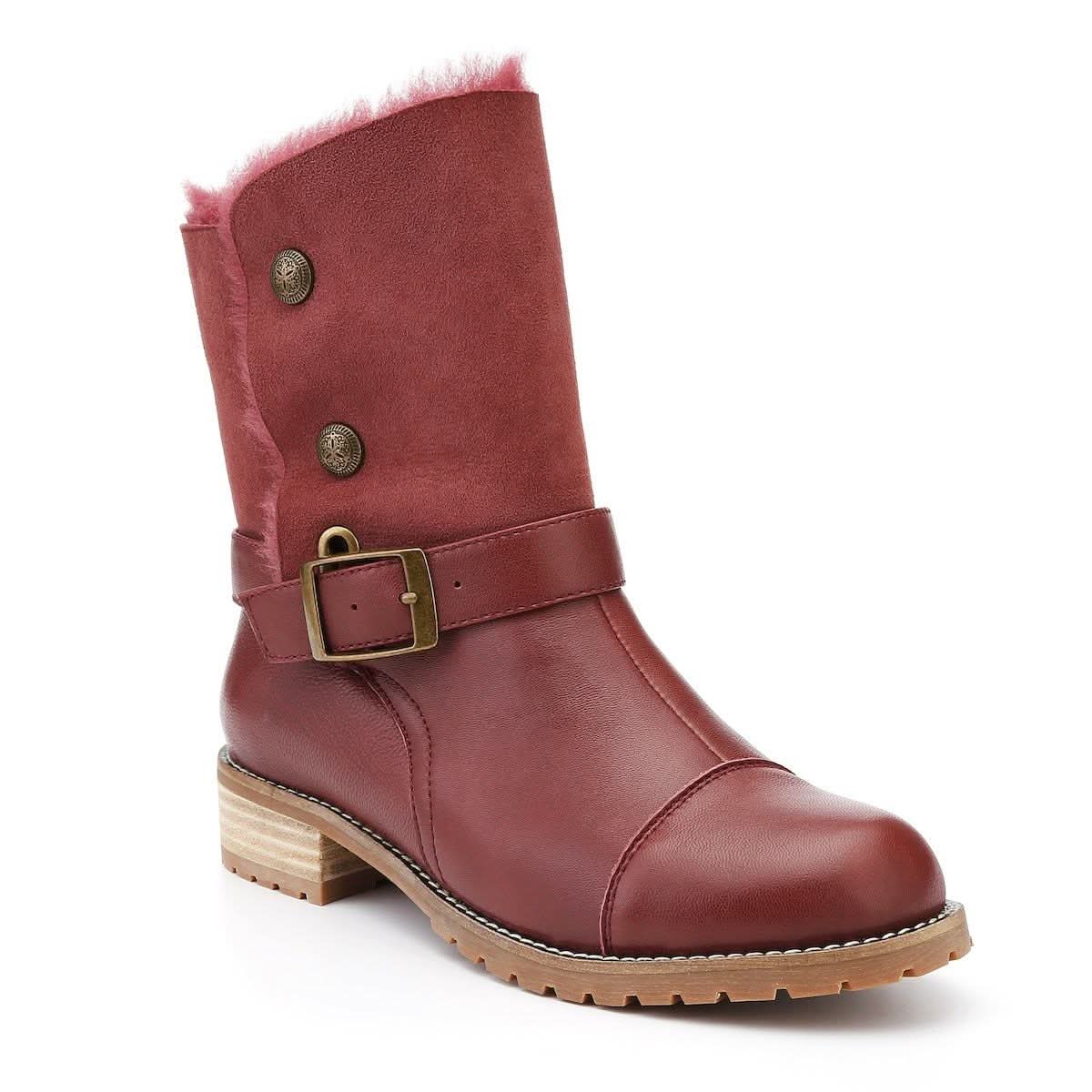 Burgundy sheepskin calf boot with wool lining and buckle strap, side view. - Yellow Earth Australia