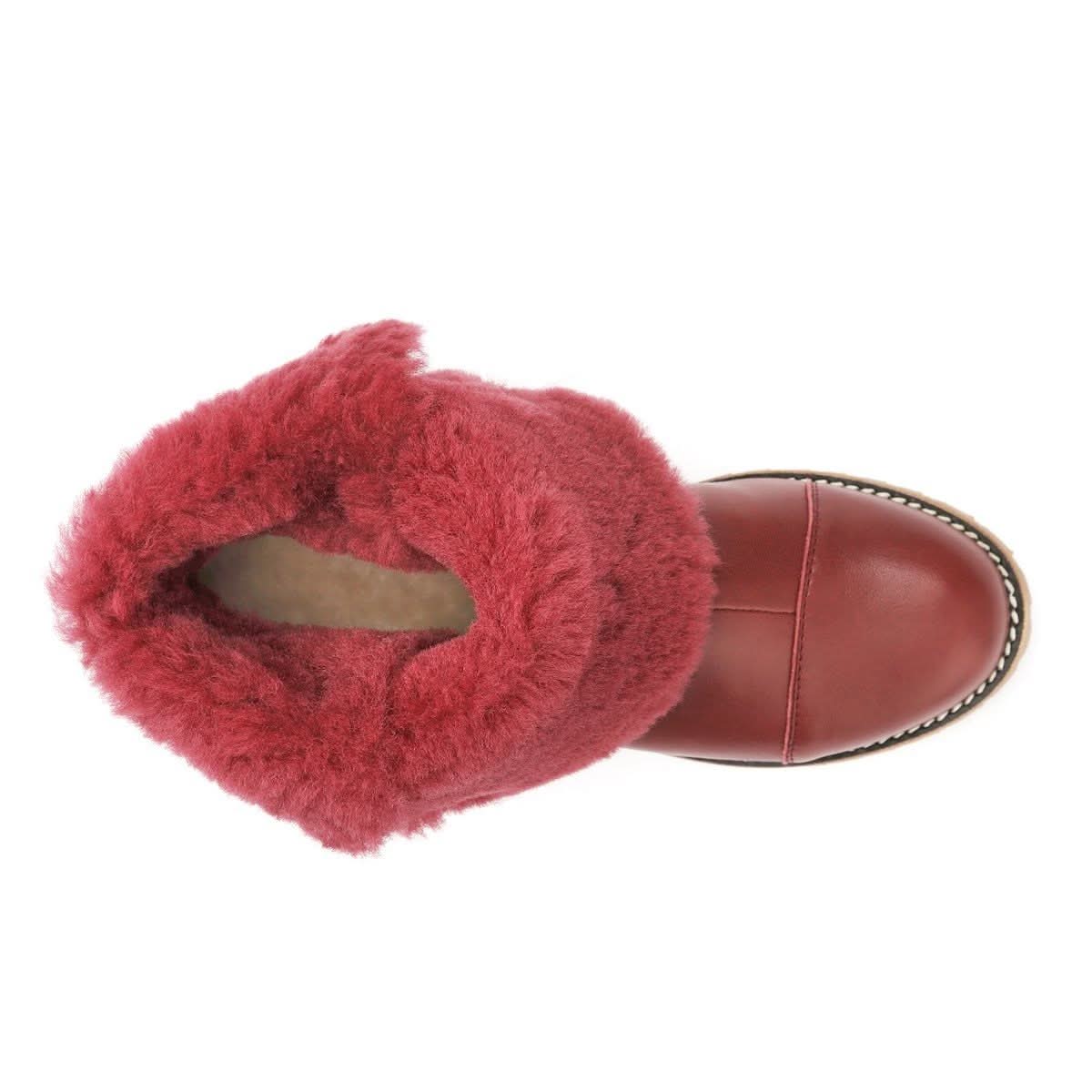 Pink sheepskin boot with fluffy wool lining, top-down view. - Yellow Earth Australia