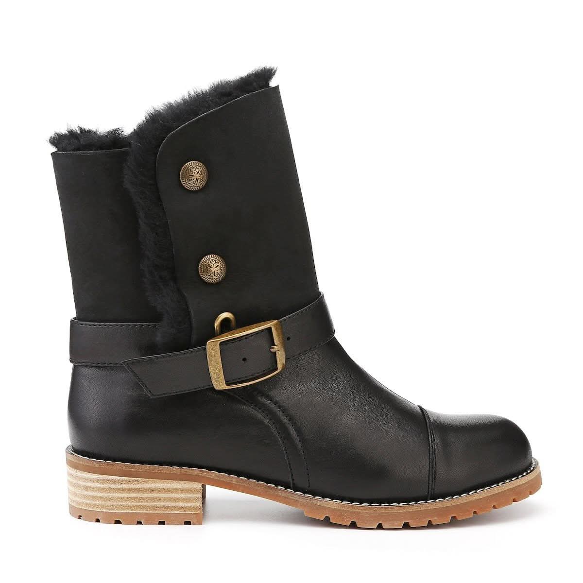 Black sheepskin wool mid-calf boot with fur lining and buckle strap, side view. - Yellow Earth Australia