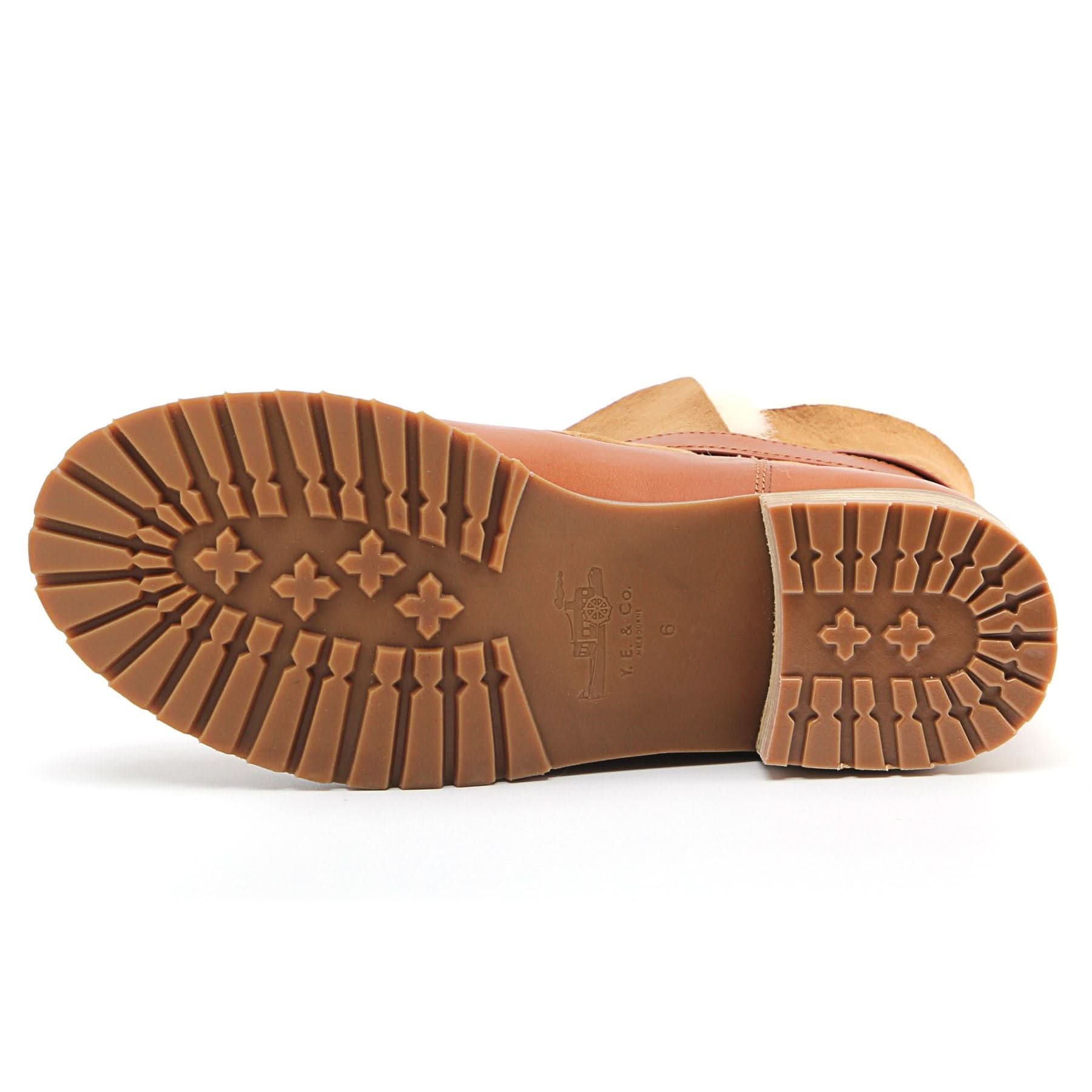 Tan leather boots with chunky lugged sole shown from underneath sole view. - Yellow Earth Australia