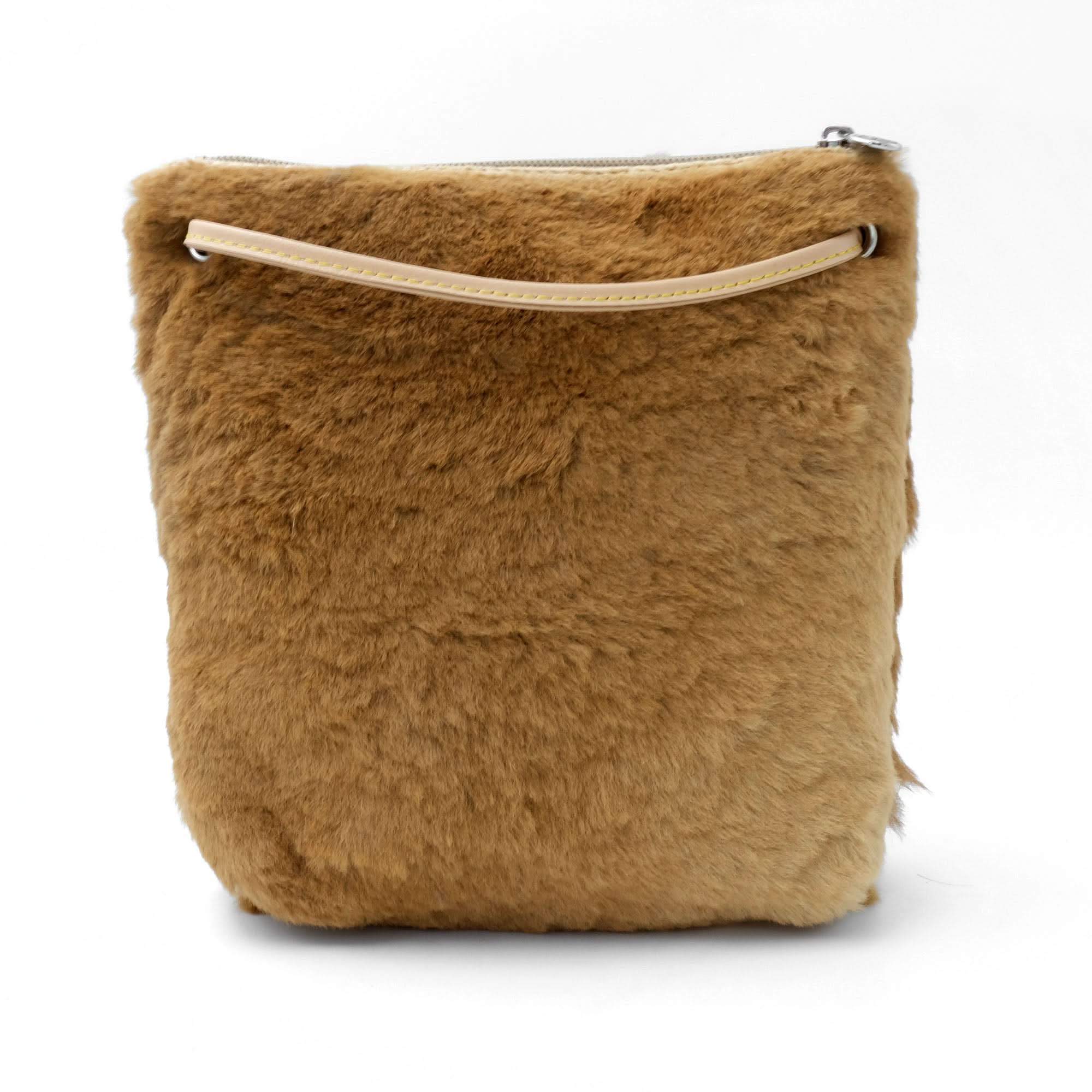 Camel fluffy sheepskin crossbody bag with cream leather handle, front view. - Yellow Earth Australia