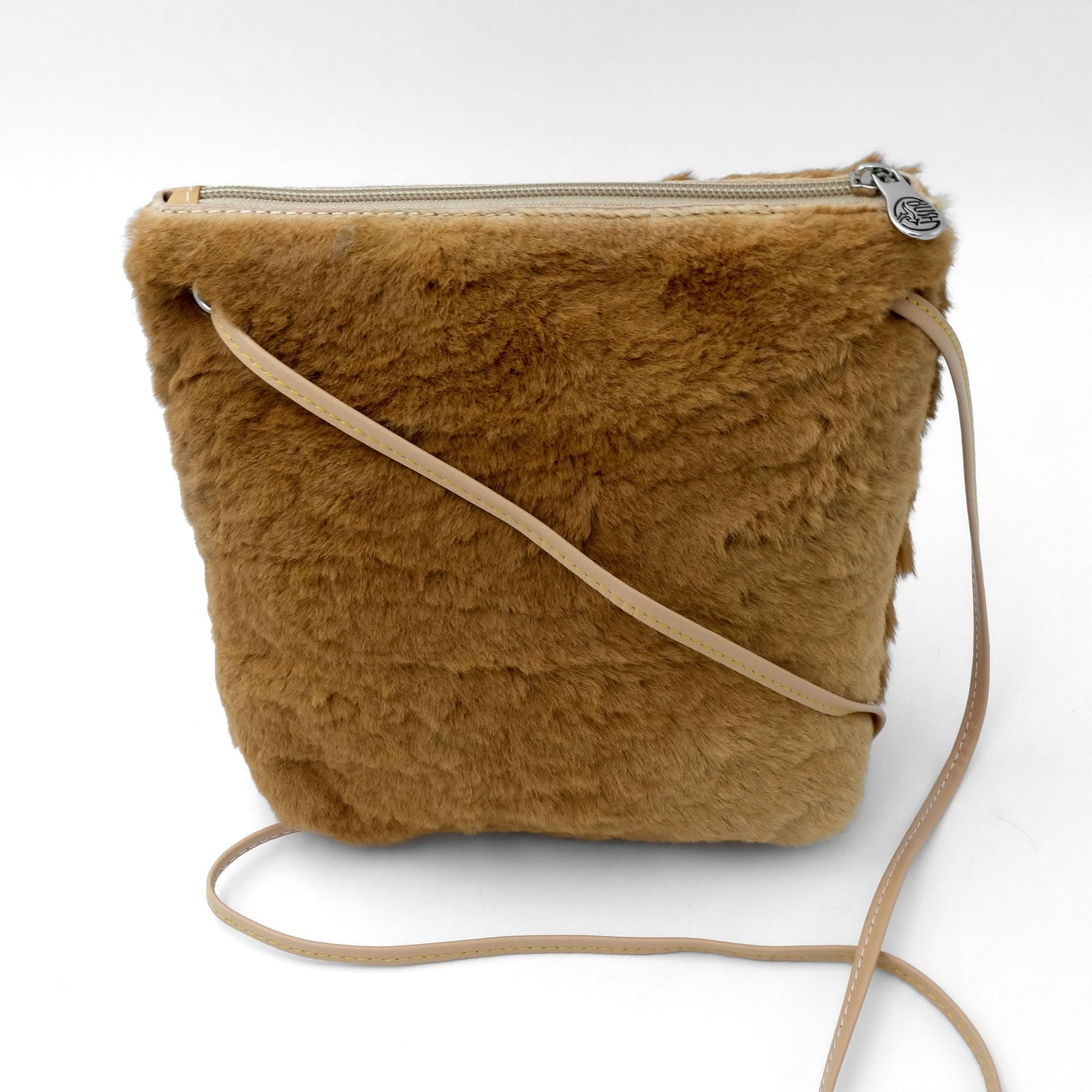 Caramel sheepskin crossbody bag with soft fur texture, front view. - Yellow Earth Australia