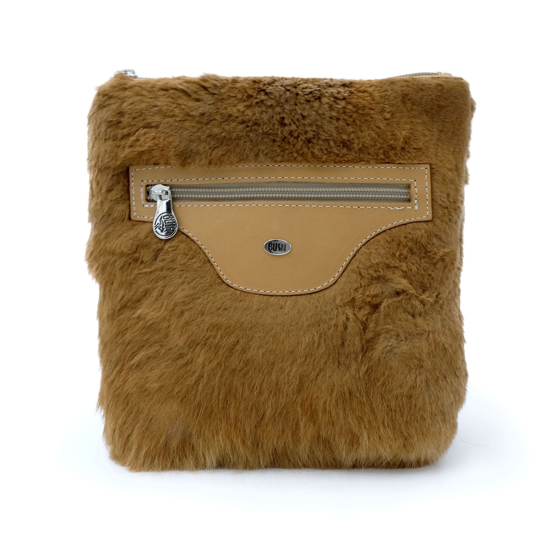Tan sheepskin crossbody bag with leather trim, front view. - Yellow Earth Australia