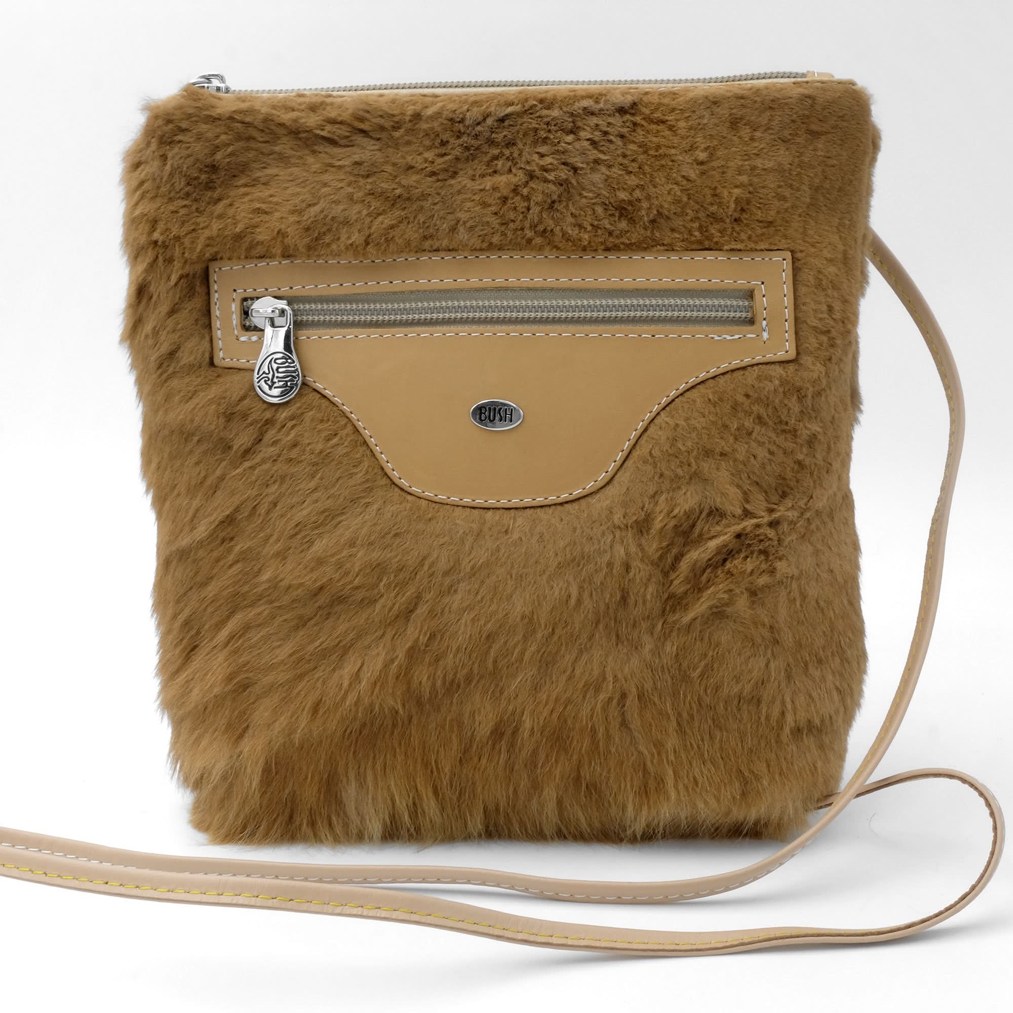 Tan sheepskin crossbody bag with leather trim, front view. - Yellow Earth Australia
