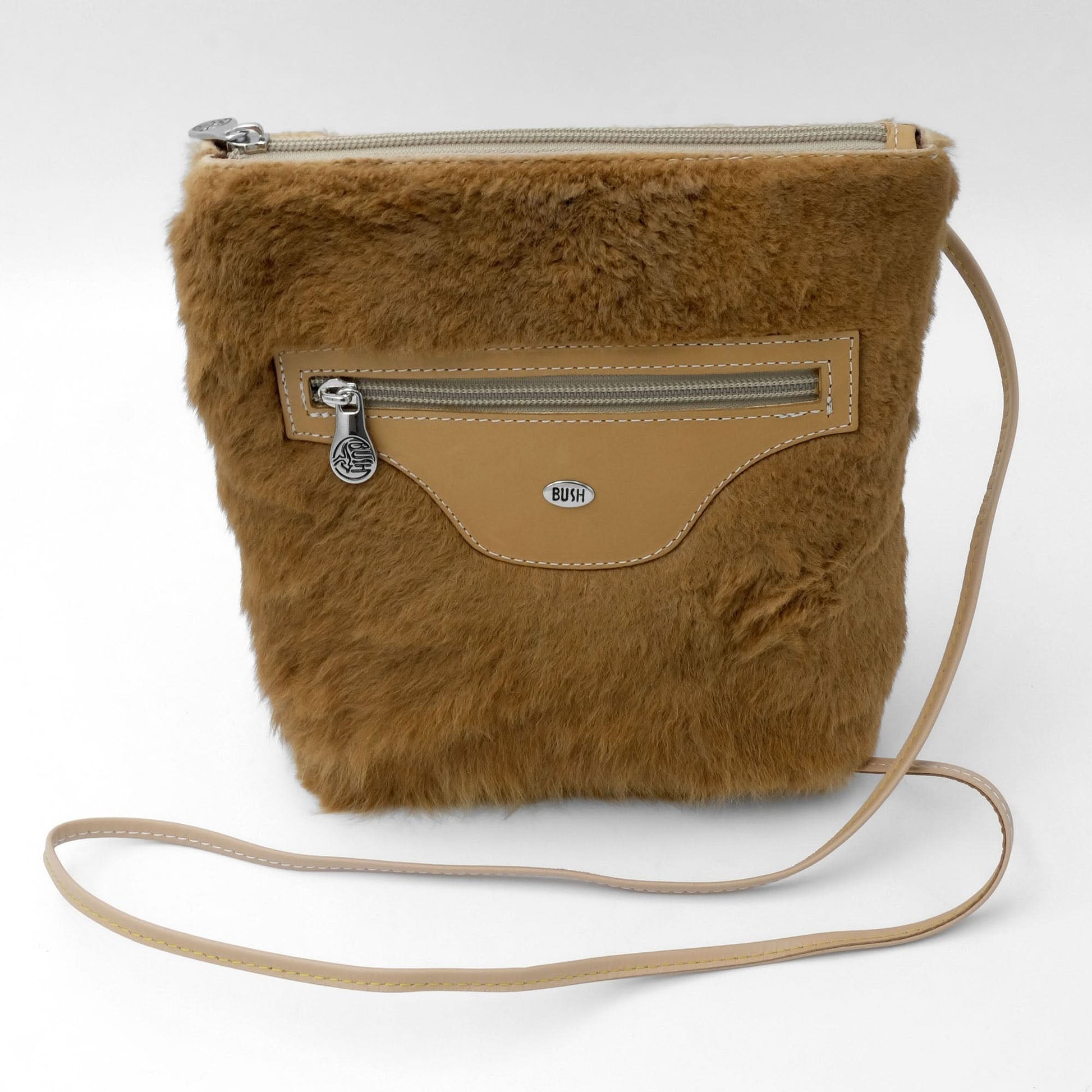 Tan sheepskin crossbody bag with leather trim, front view. - Yellow Earth Australia