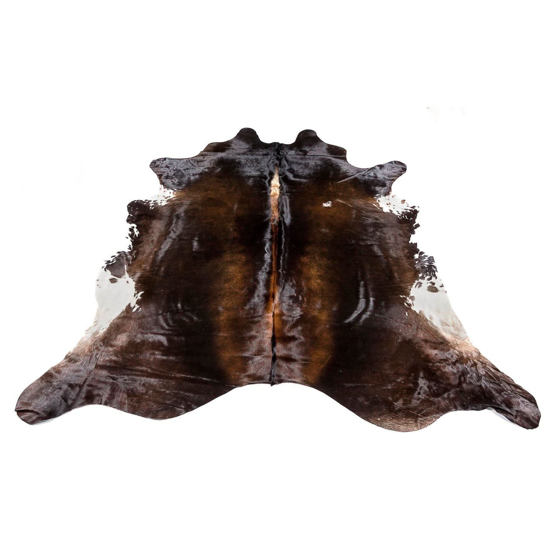 Dark brown and white cowhide rug displayed flat on white background. - Yellow Earth Australia