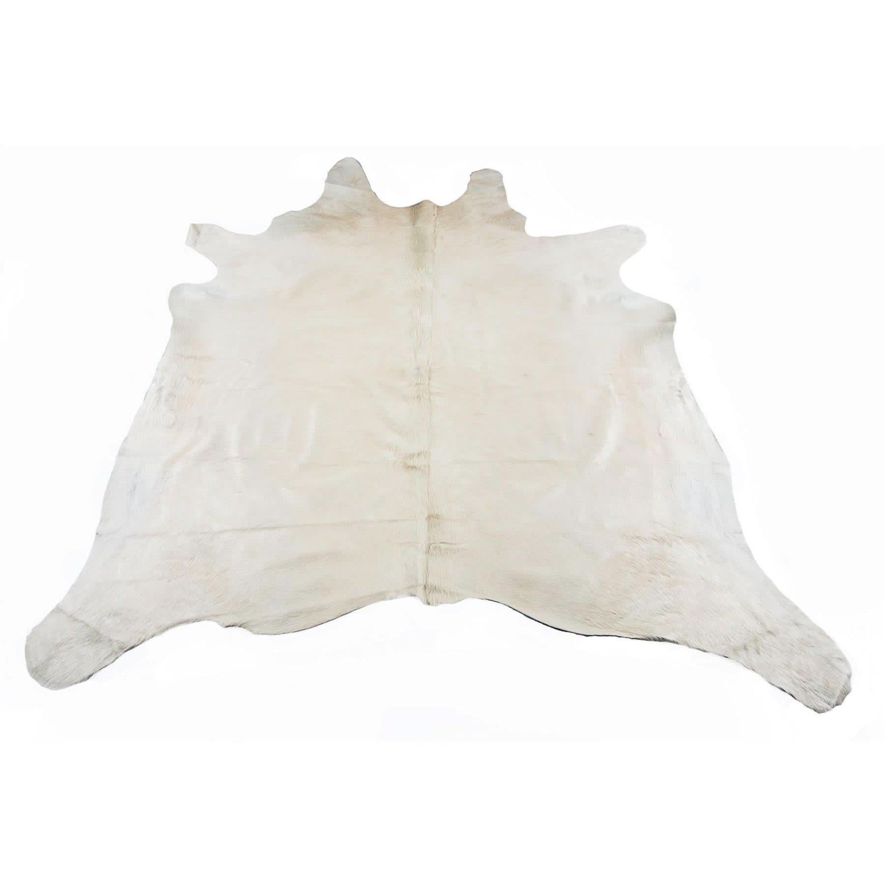 White natural sheepskin rug with fur texture, flat lay overhead view. - Yellow Earth Australia