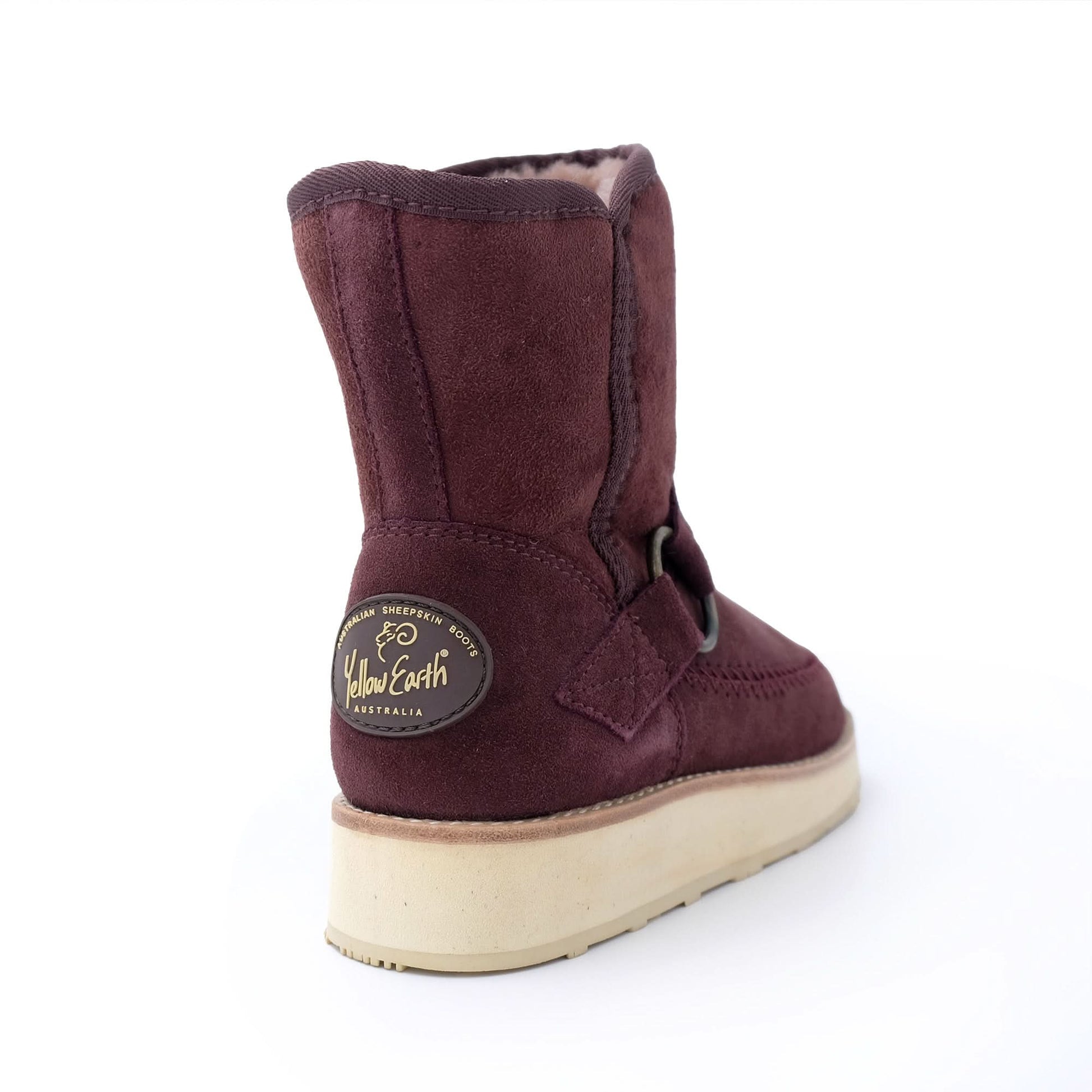 Burgundy sheepskin boot with wool lining, rear three-quarter view. - Yellow Earth Australia