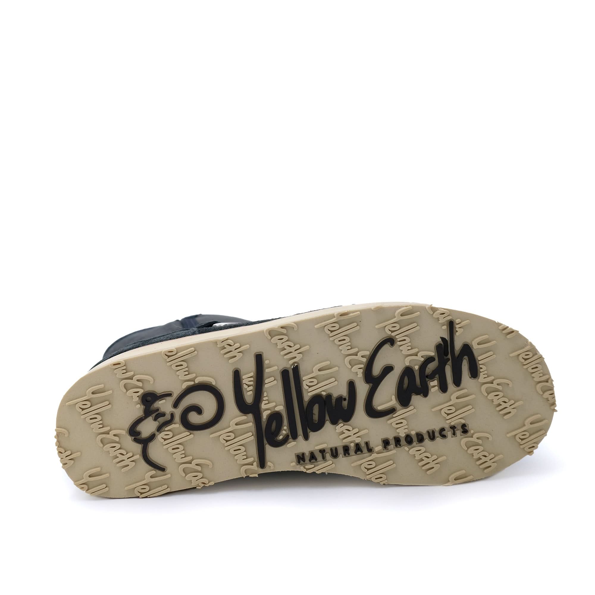 Navy sheepskin boot sole showing natural products branded texture detail. - Yellow Earth Australia