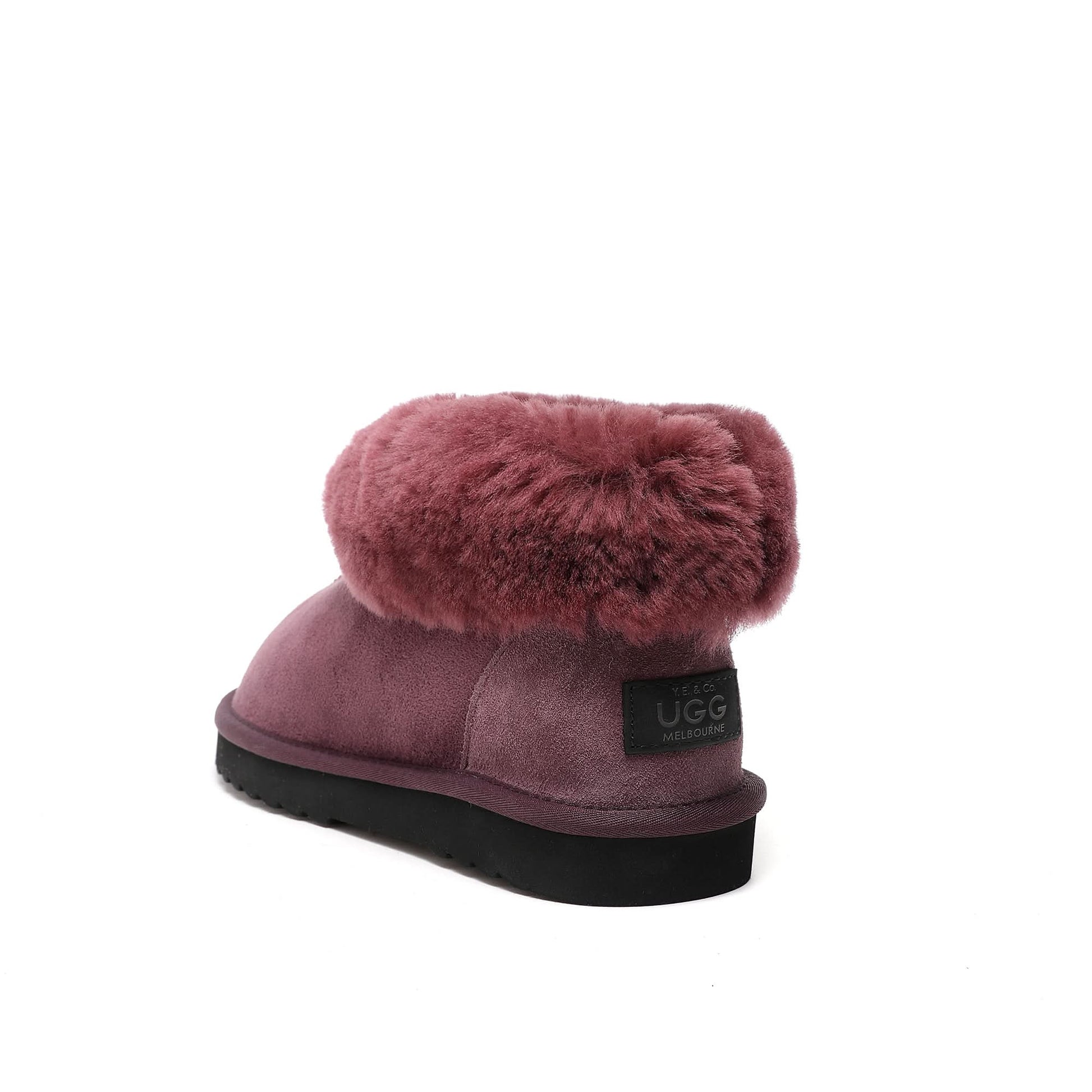 Mauve sheepskin boot with fluffy wool cuff, displayed from rear angle on white background. - Yellow Earth Australia