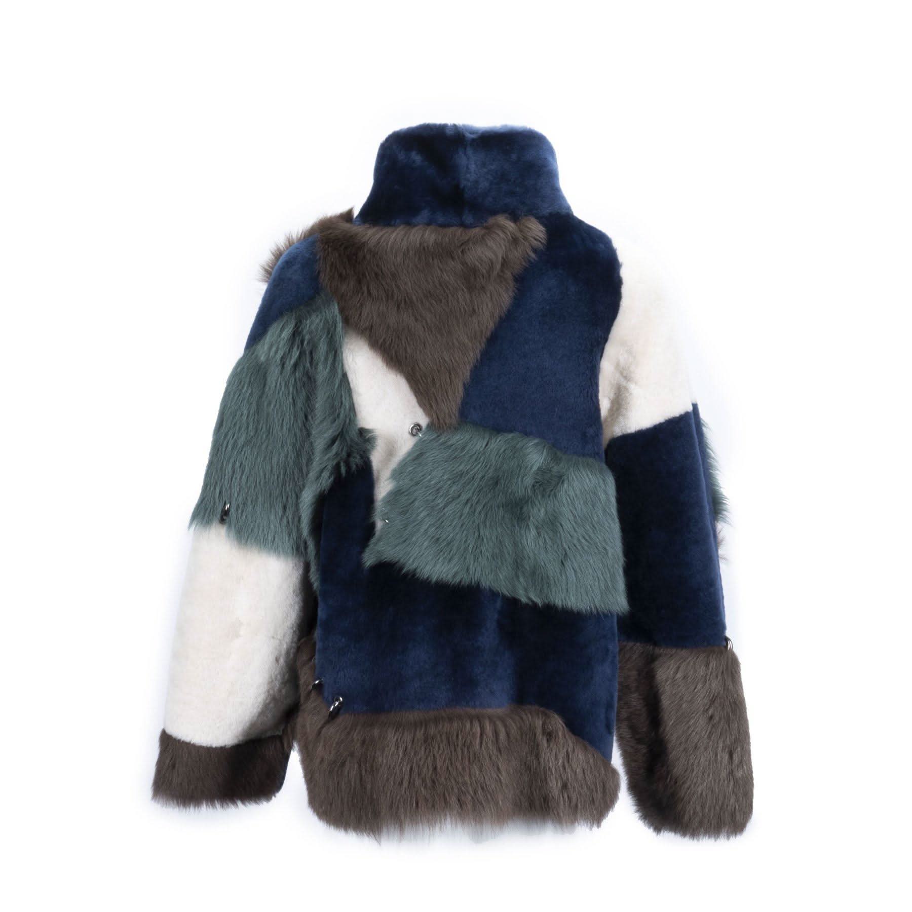 Colorblock sheepskin jacket with navy, brown, white and sage fur panels, back view. - Yellow Earth Australia