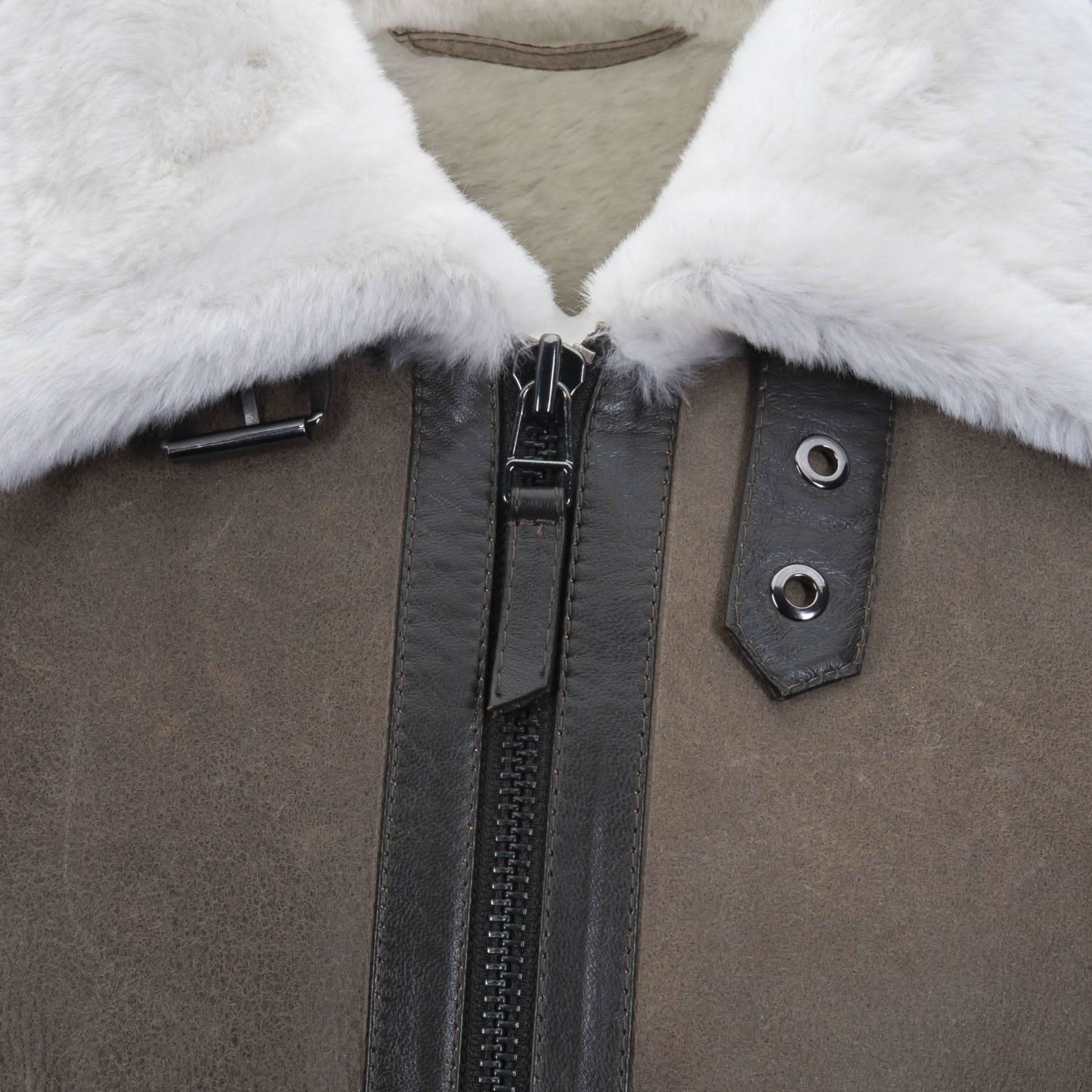 Sheepskin jacket with white fur collar and black leather trim, front view detail. - Yellow Earth Australia