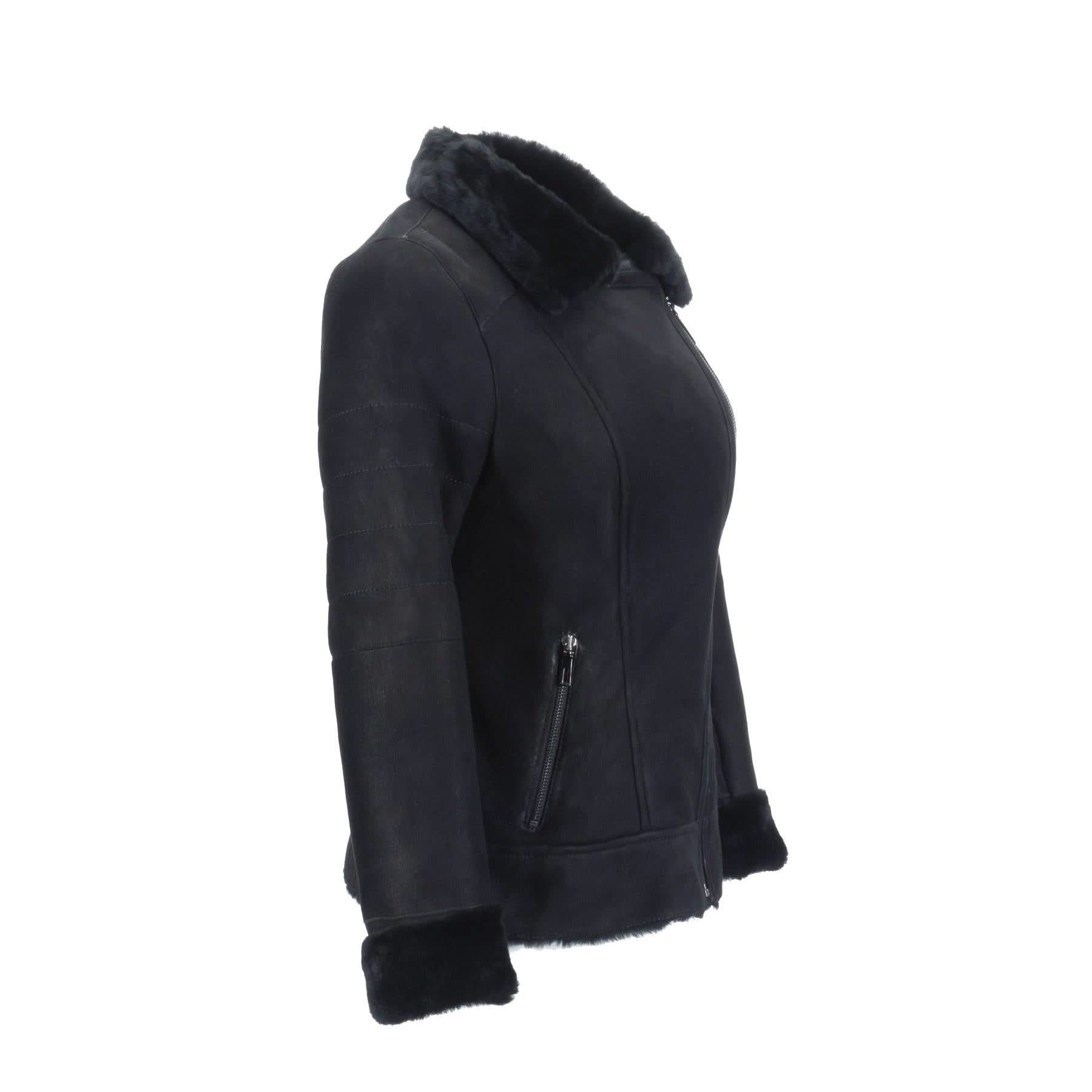 Black sheepskin jacket with fur collar and cuffs, side view. - Yellow Earth Australia