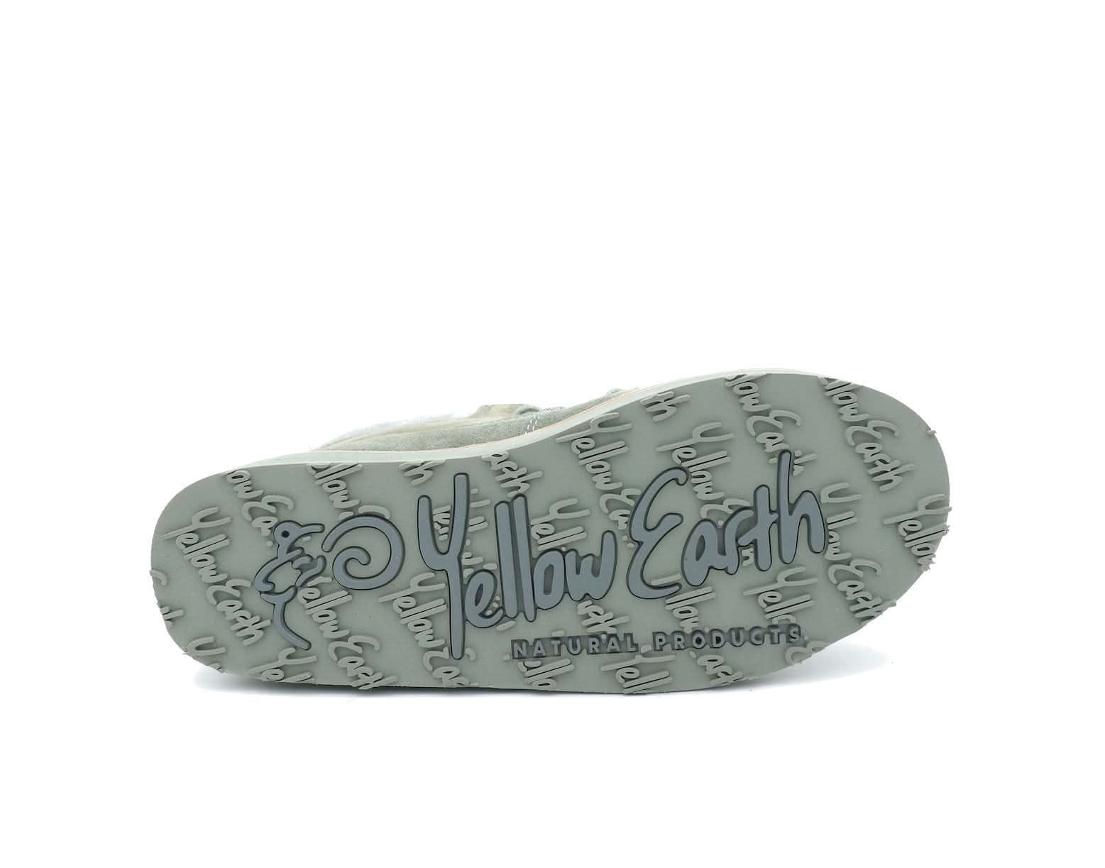 Beige sheepskin slipper sole showing natural wool texture and grip pattern. - Yellow Earth Australia