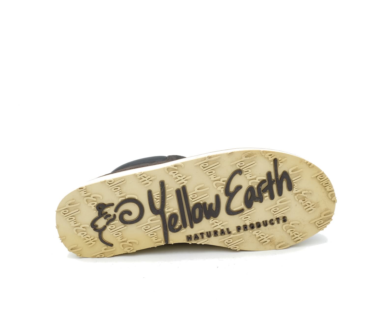Cream sheepskin slipper sole with textured grip pattern, bottom view. - Yellow Earth Australia