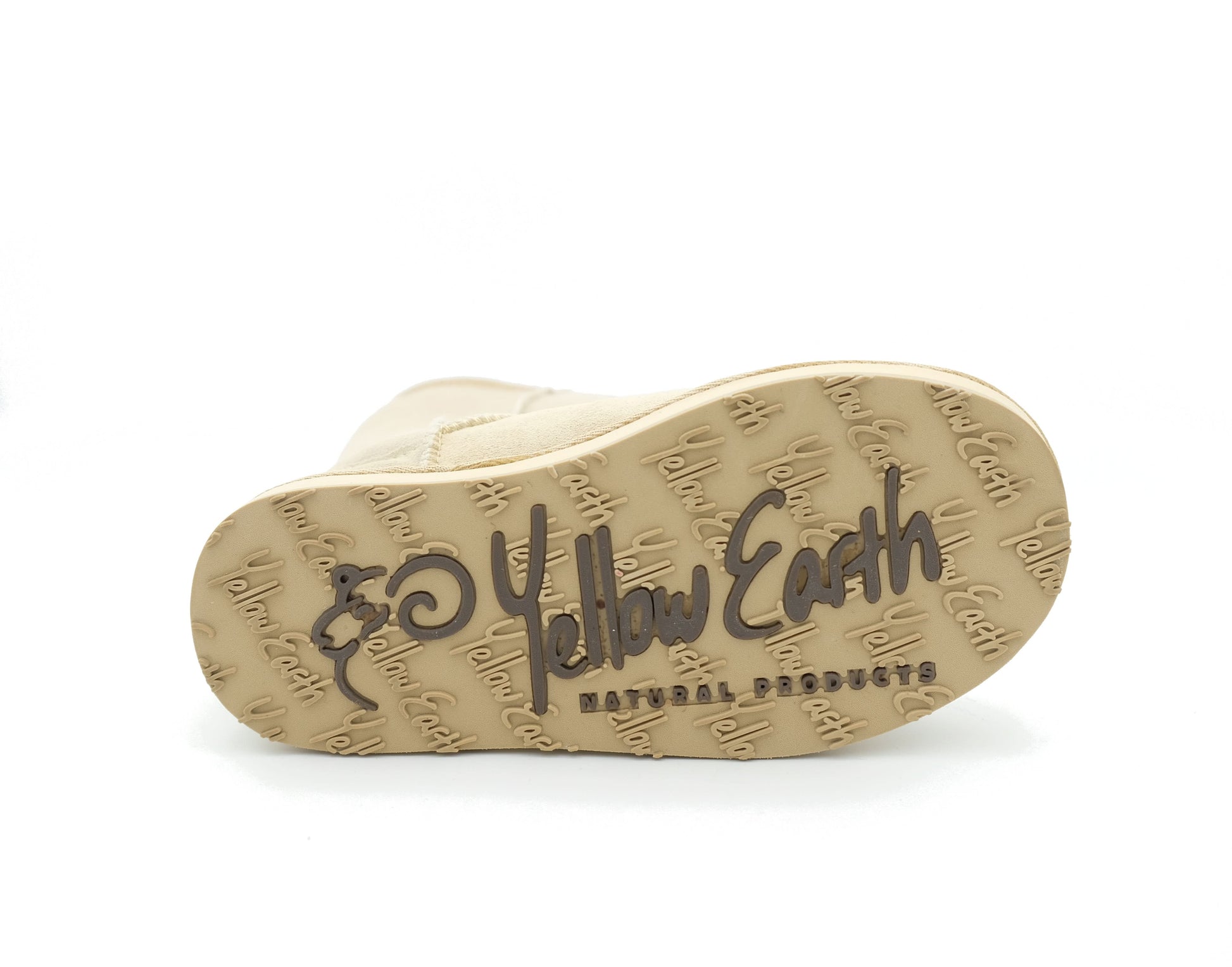 Beige sheepskin slipper with textured sole, bottom view. - Yellow Earth Australia