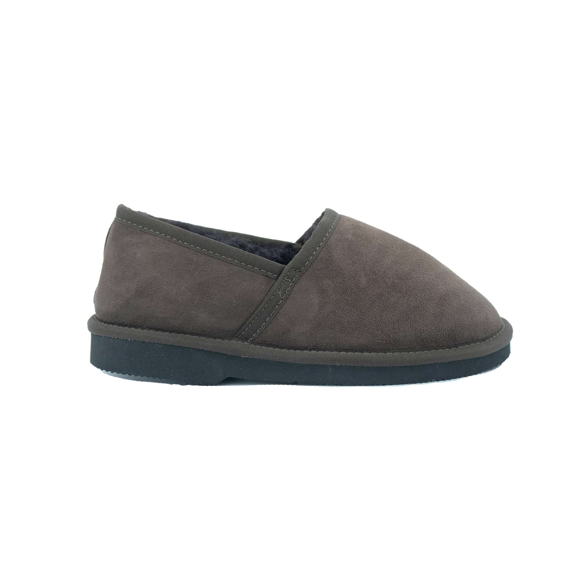 Grey suede sheepskin slipper with dark sole, side view. - Yellow Earth Australia